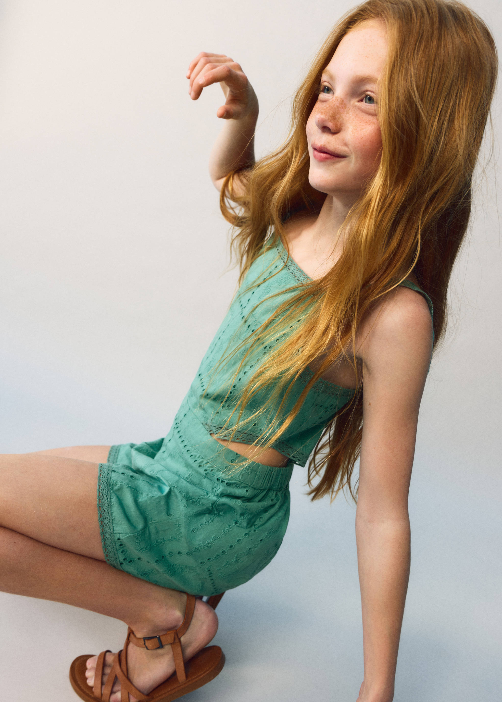 Embroidered jumpsuit with side openings - Details of the article 1