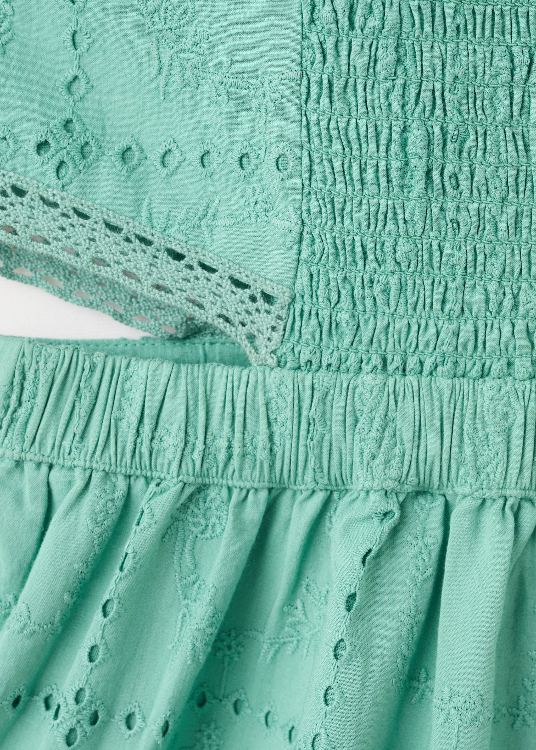 Embroidered jumpsuit with side openings - Details of the article 0