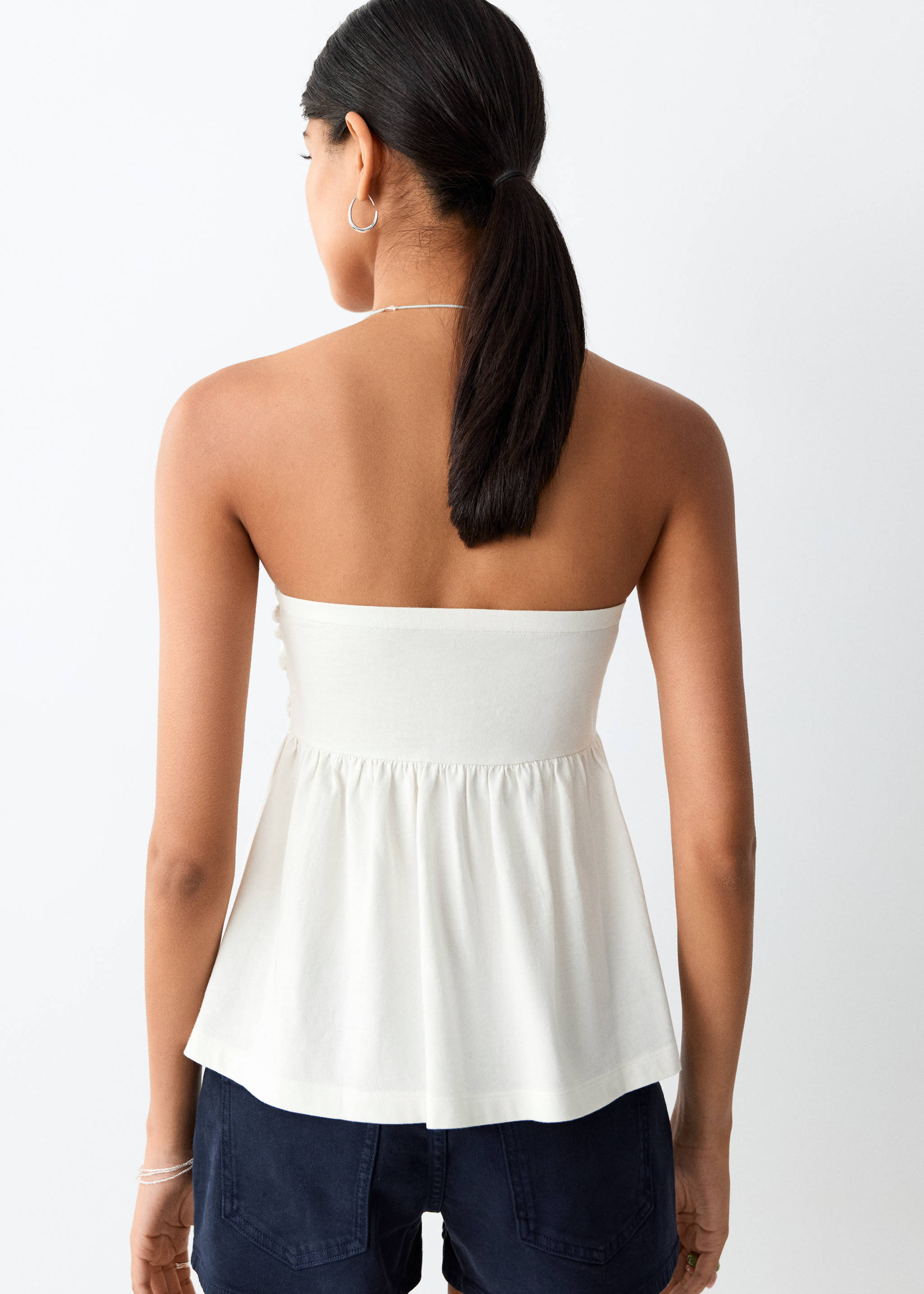 Embroidered strapless top - Reverse of the article