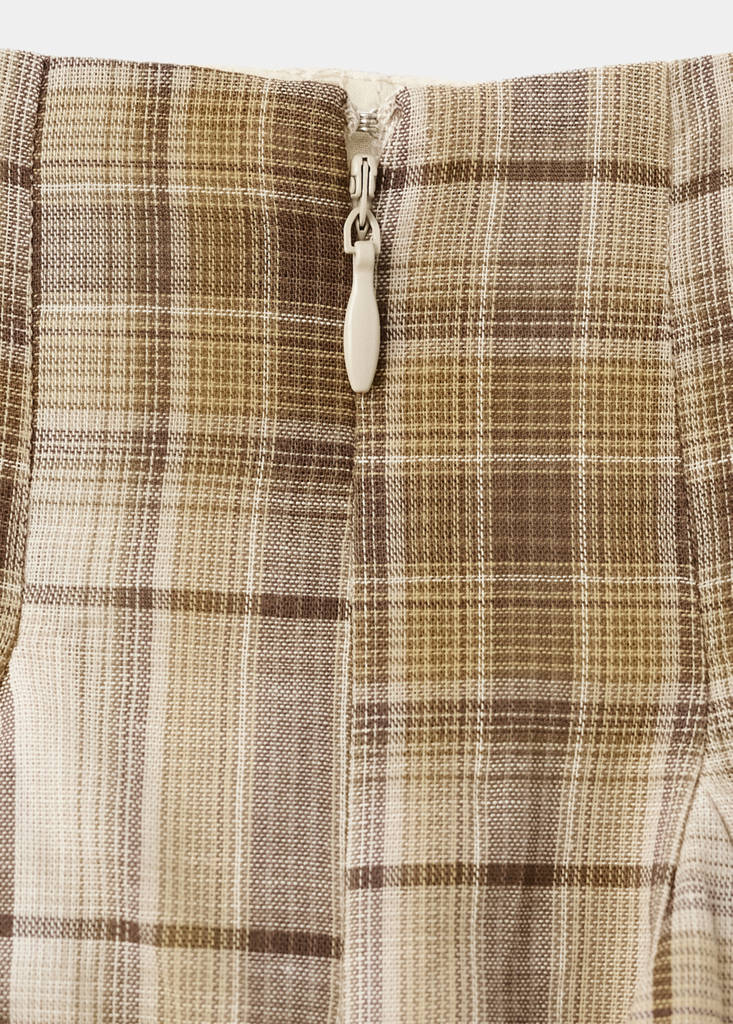 Pleated check skirt — Brown