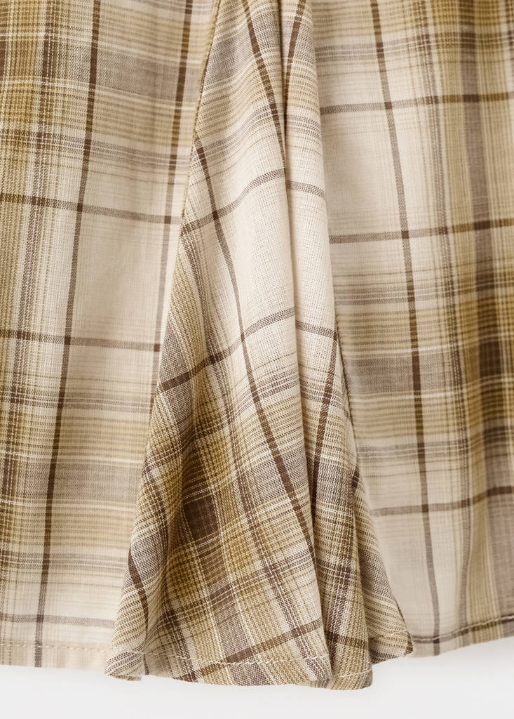 Pleated check skirt — Brown