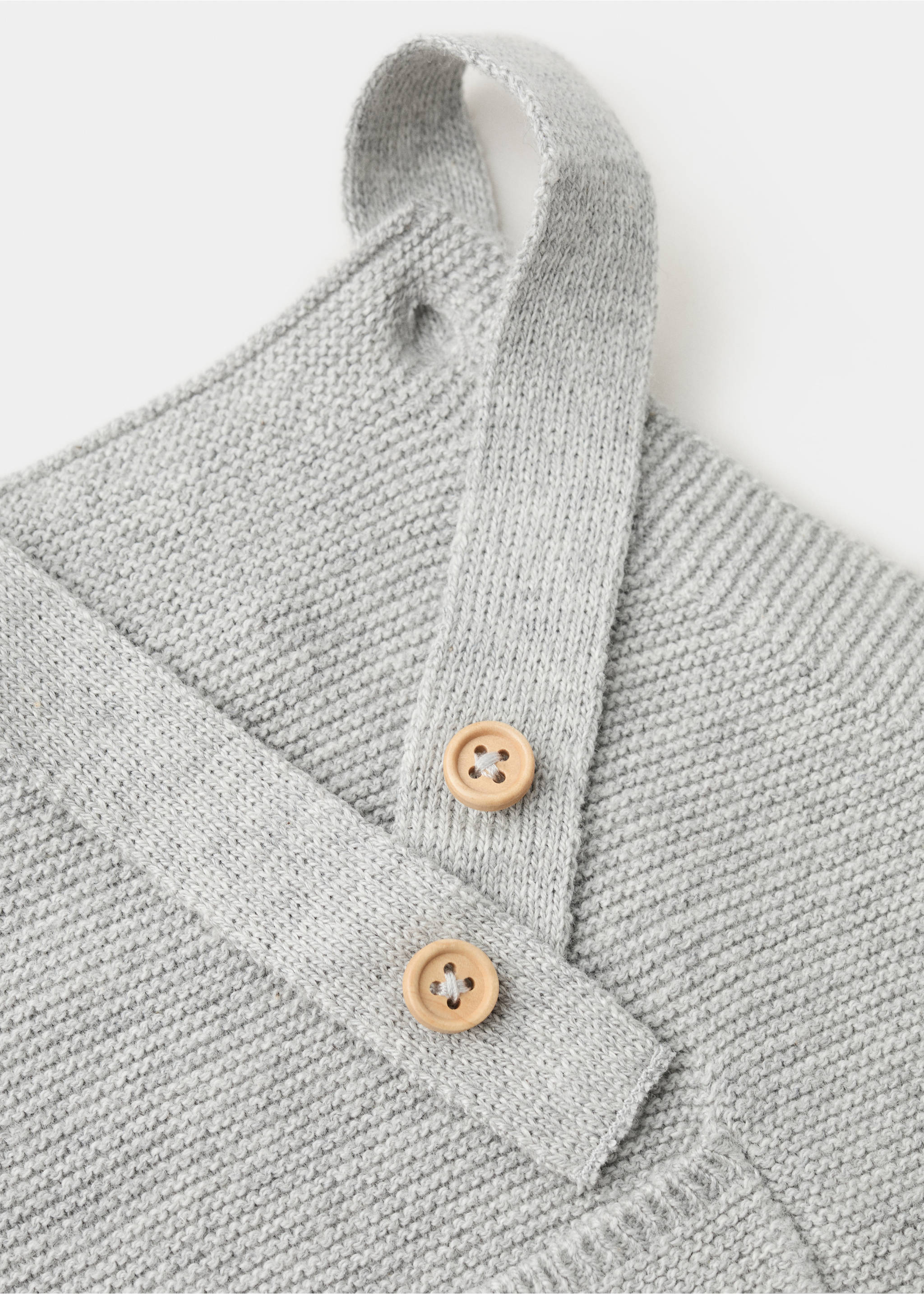 Long knitted dungarees - Details of the article 8, Medium Heather Grey. Ref: 27091235-00.
