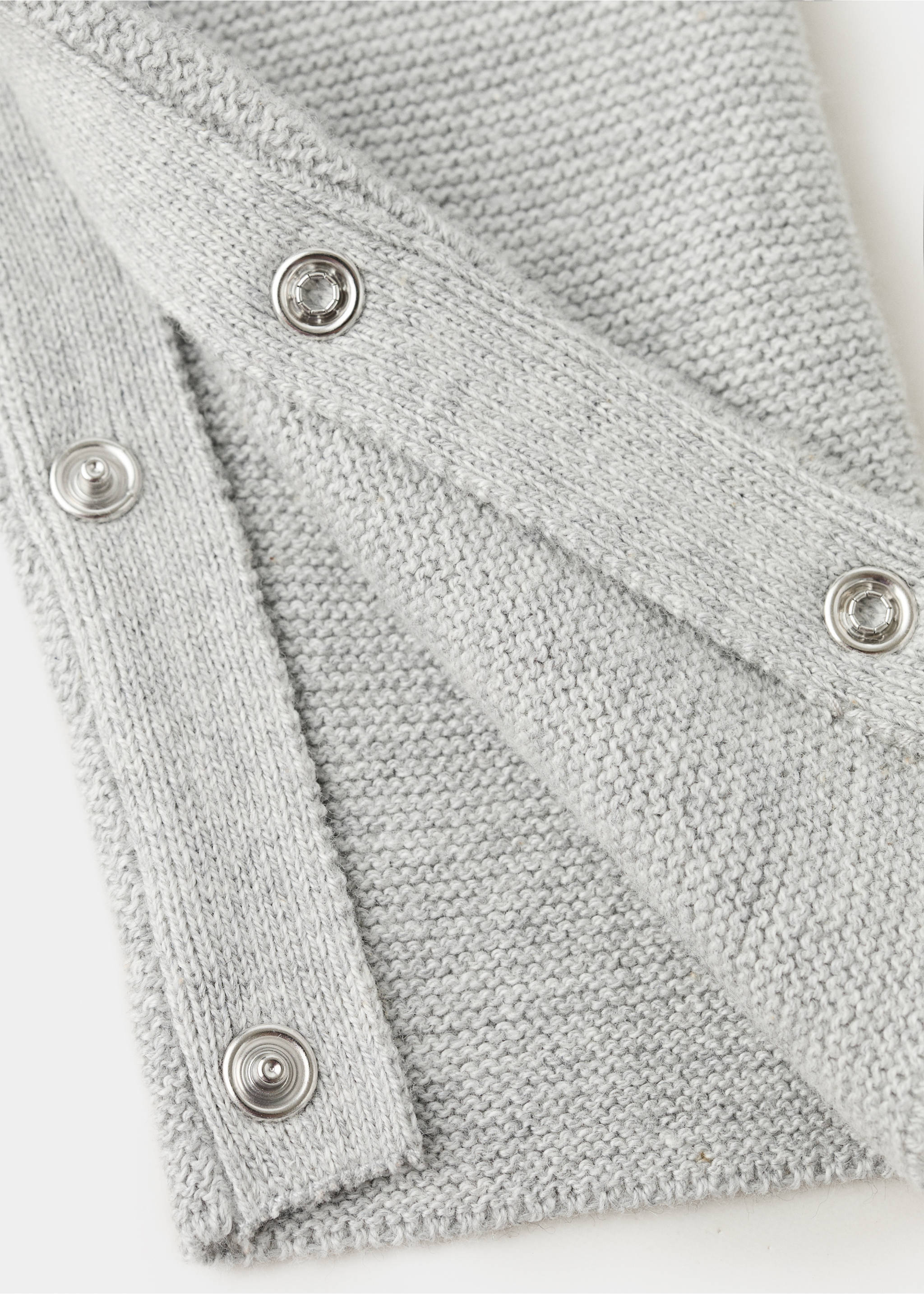 Long knitted dungarees - Details of the article 0, Medium Heather Grey. Ref: 27091235-00.