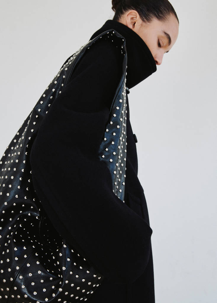 Oval studded shoulder bag — Black