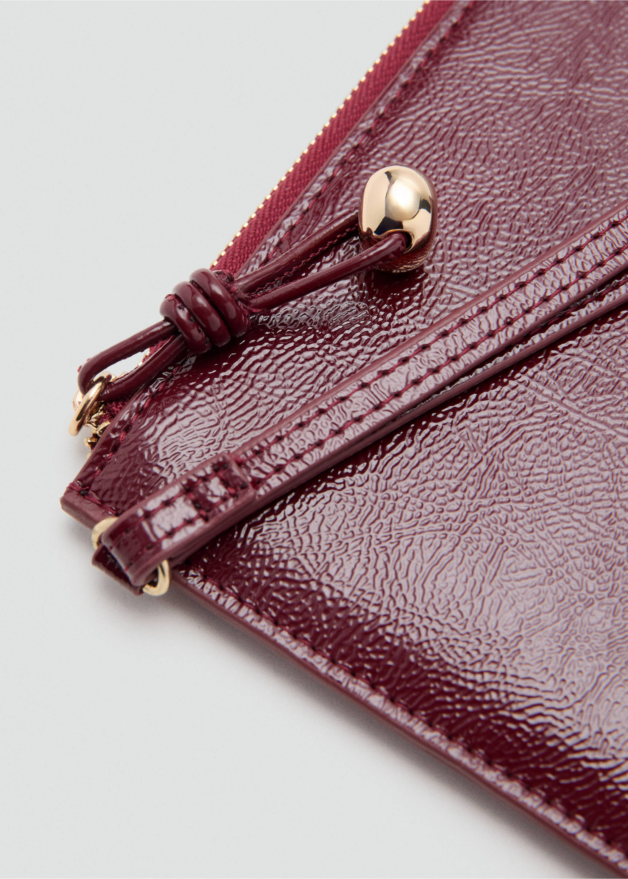 Mini beaded pochette - Details of the article 1, Burgundy. Ref: 27091275-00.