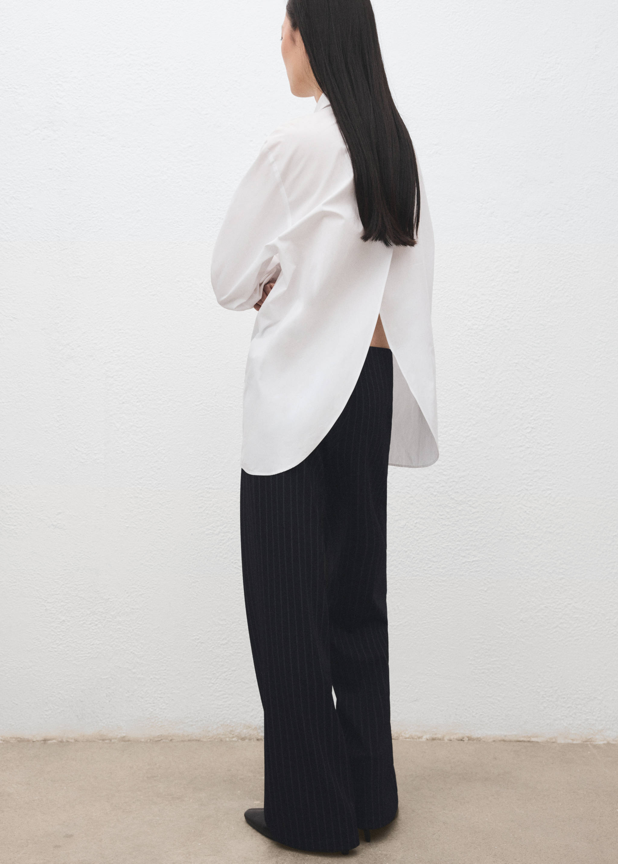 Chalk-stripe straight trousers - Reverse of the article