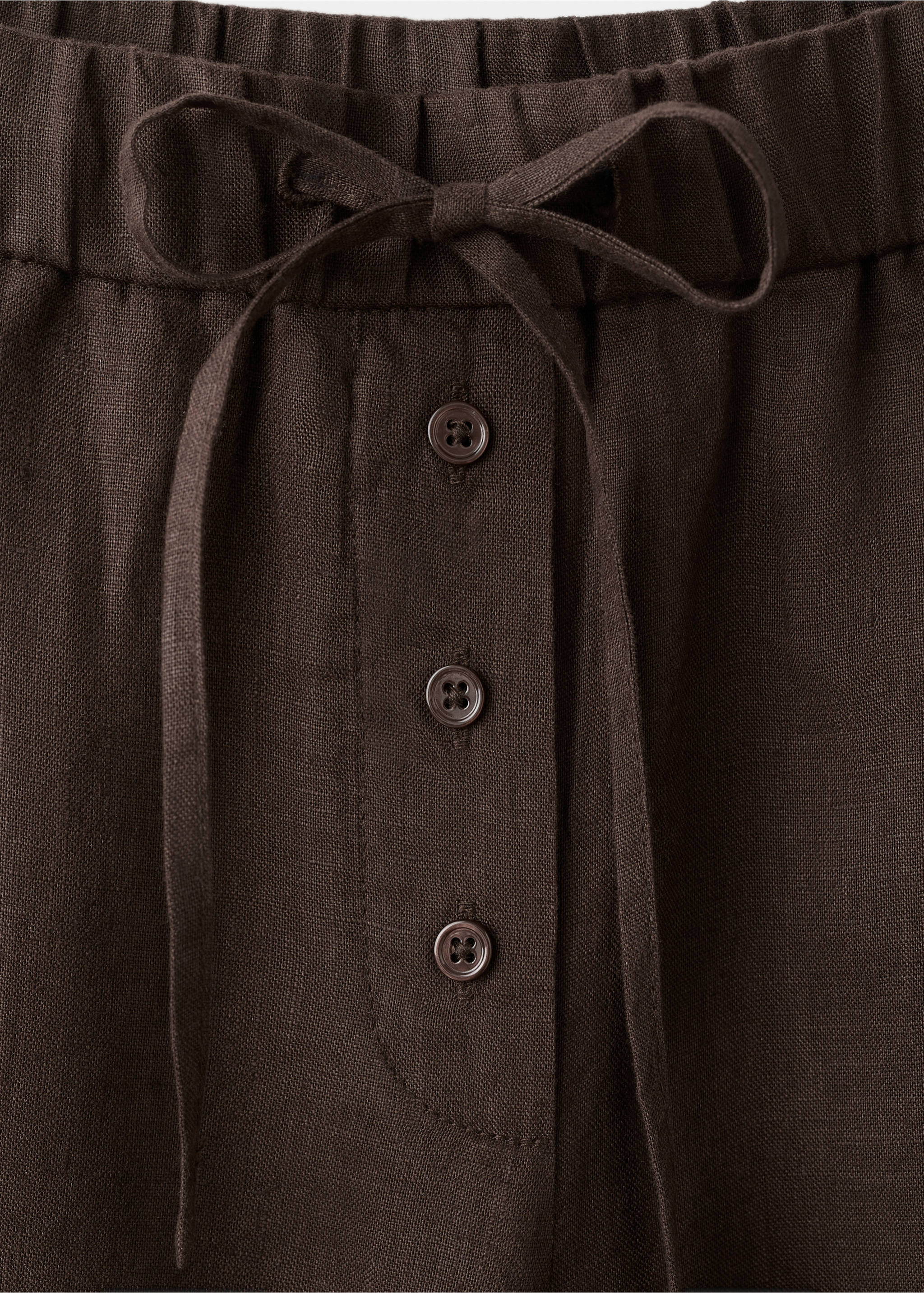 Linen trousers with buttons - Details of the article 8, Chocolate. Ref: 27091349-00.