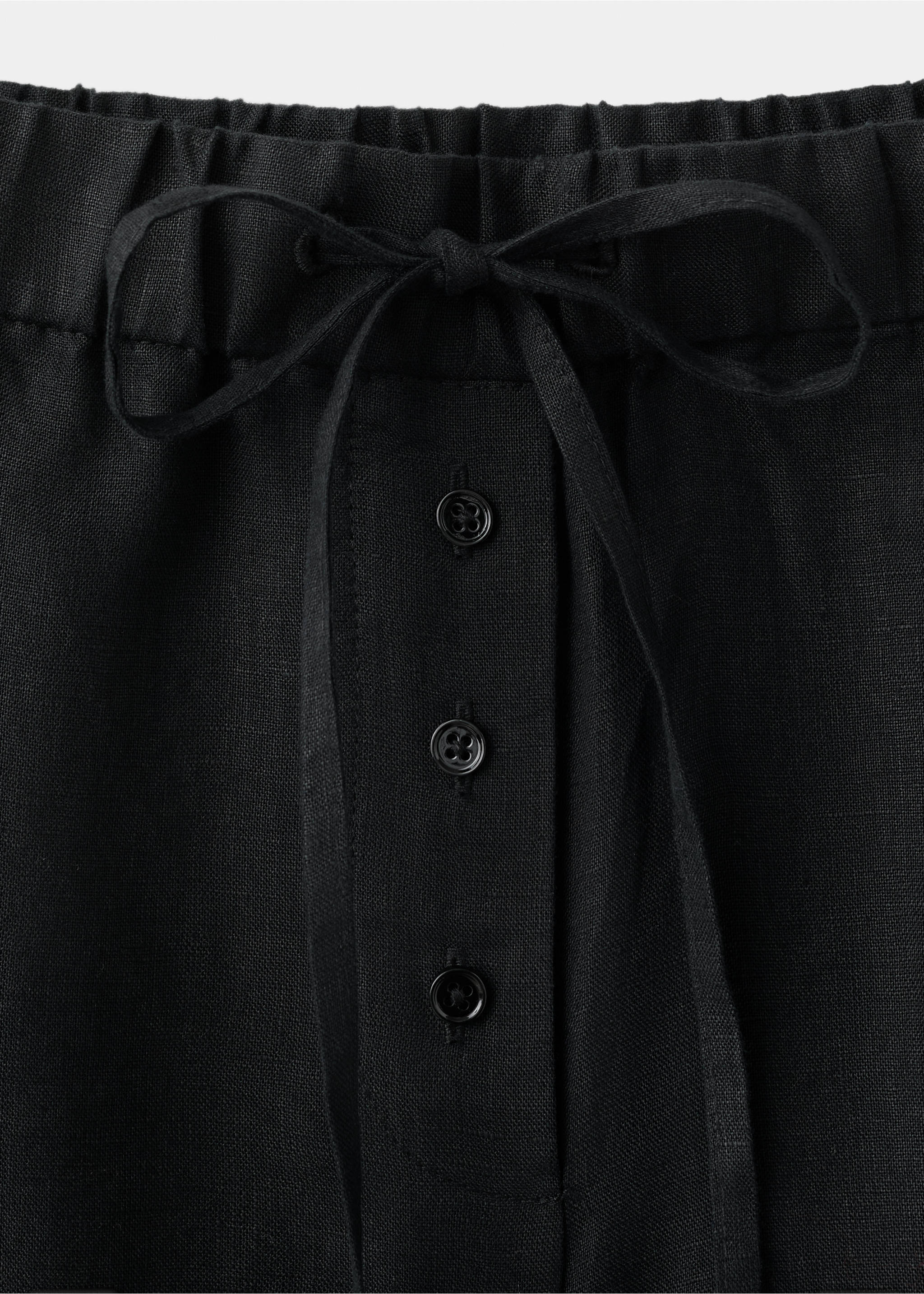 Linen trousers with buttons - Details of the article 0, Black. Ref: 27091349-00.