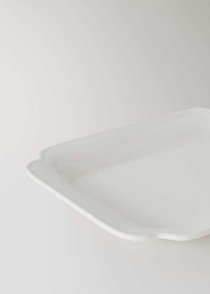 Large embossed earthenware dish — White