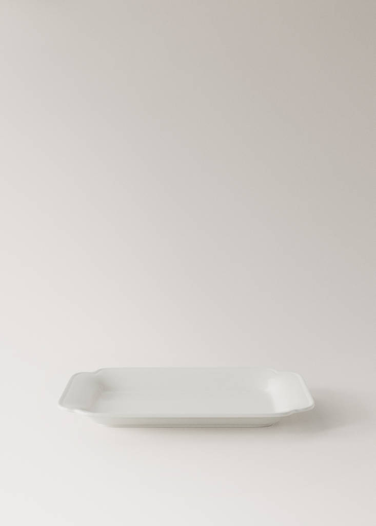 Large embossed earthenware dish — White