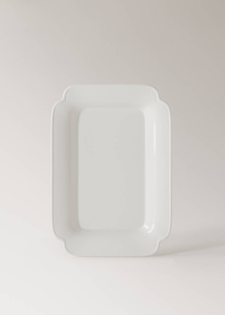 Large embossed earthenware dish — White