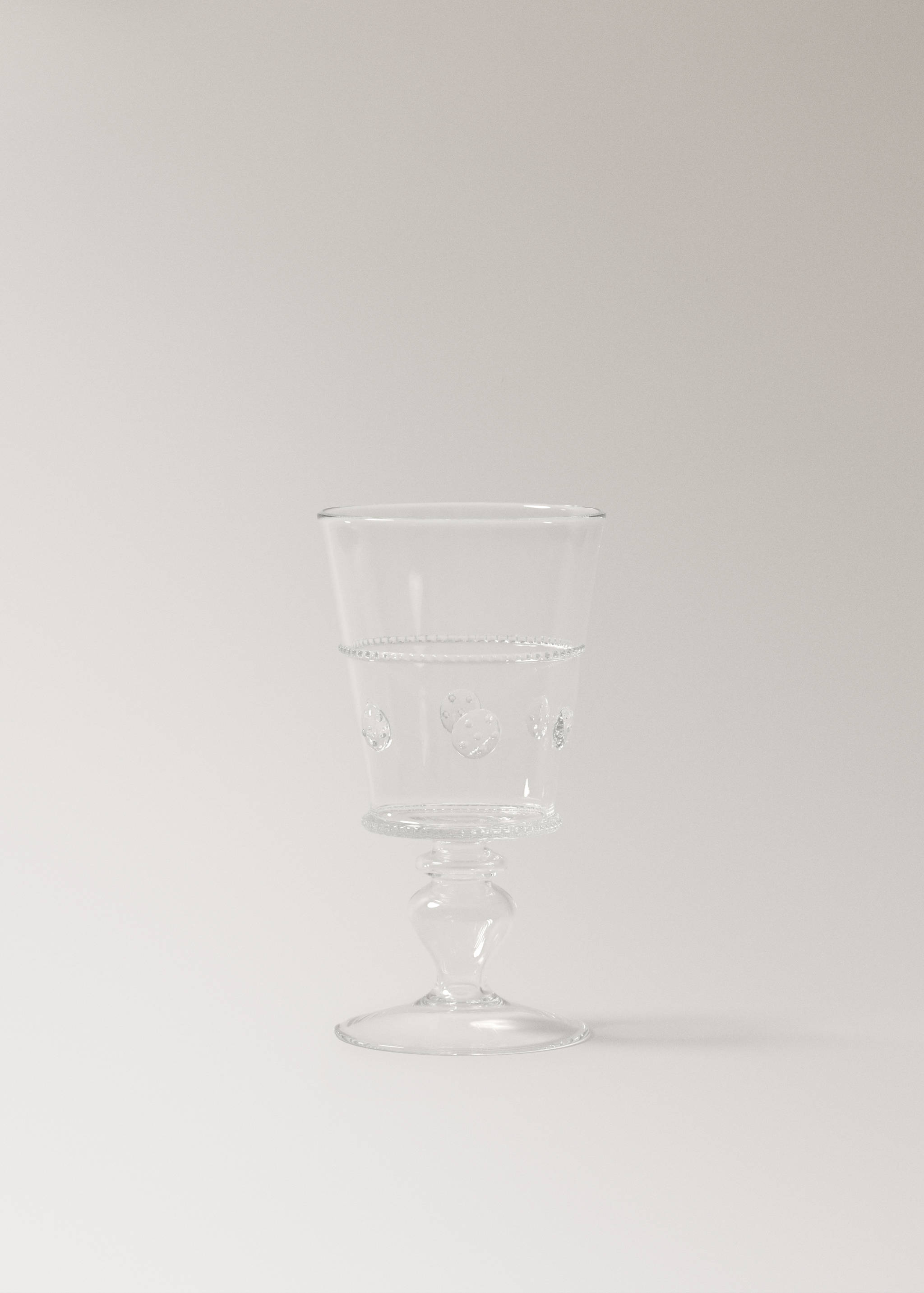 Průhledný pohár z borosilikátového skla s reliéfem - Zboží bez modelu