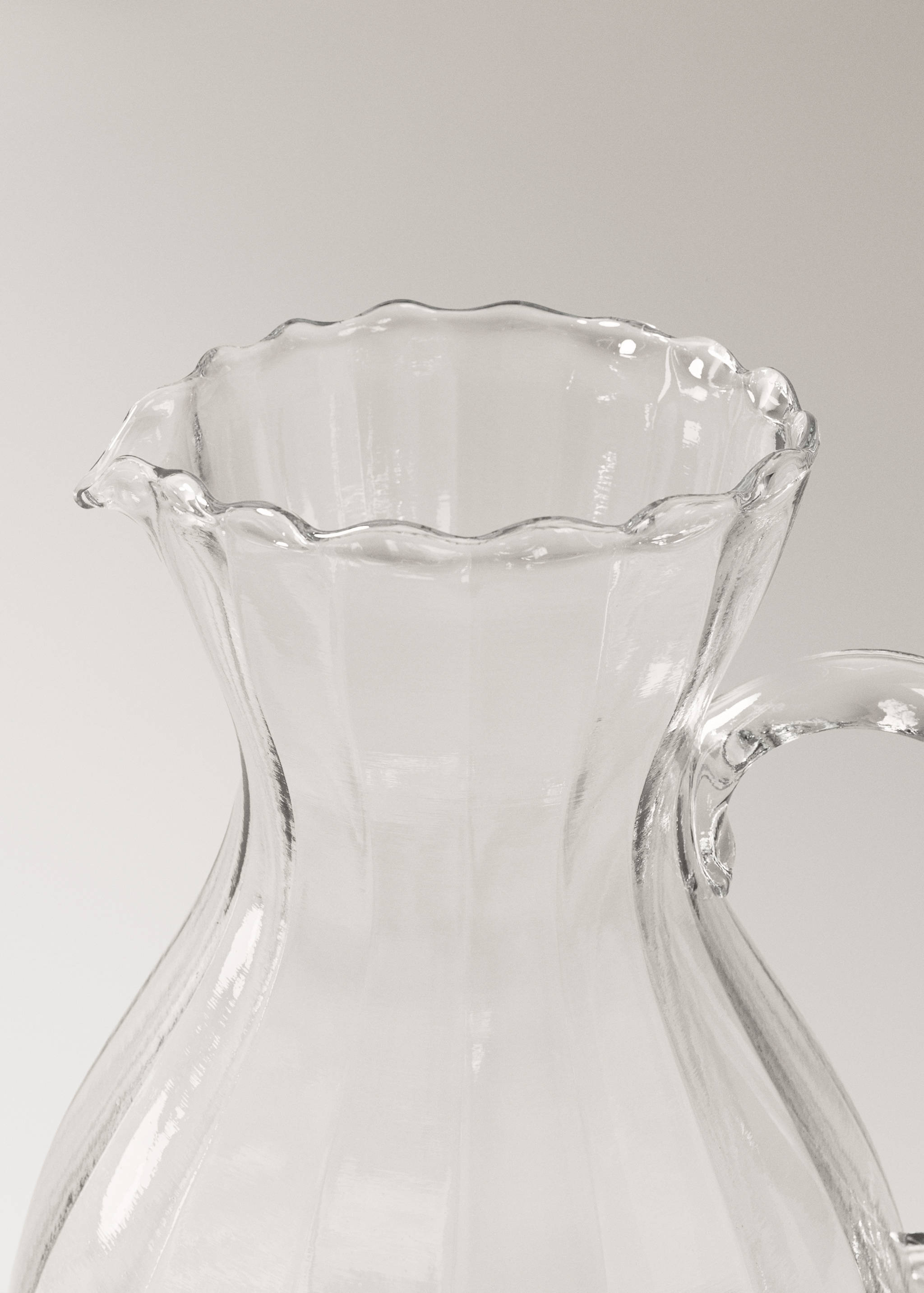 Oregelbunden glaskanna - Detaljer om artikeln 1