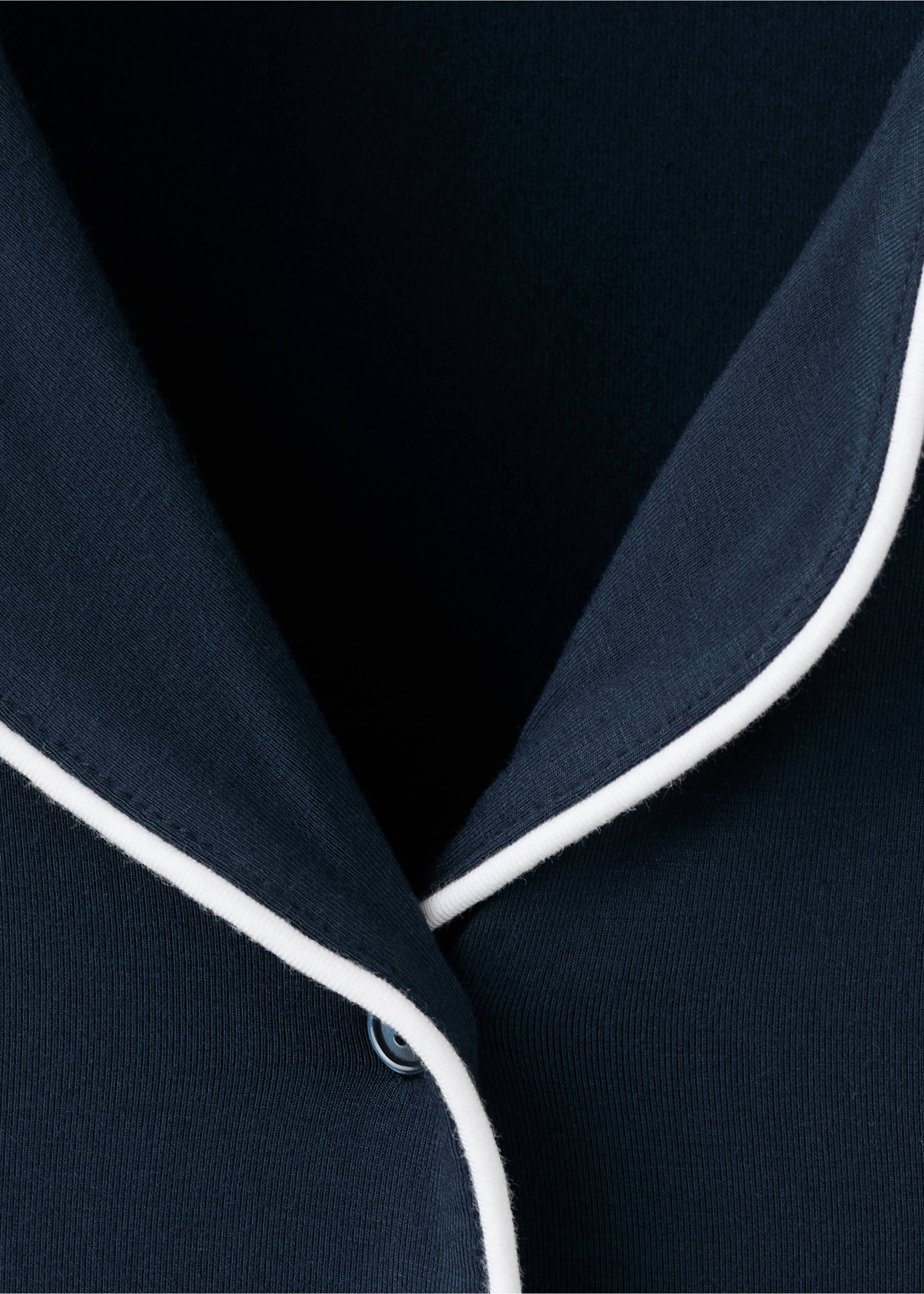 Two-piece pyjamas with piping - Details of the article 8, Indigo Blue. Ref: 27093329-00.