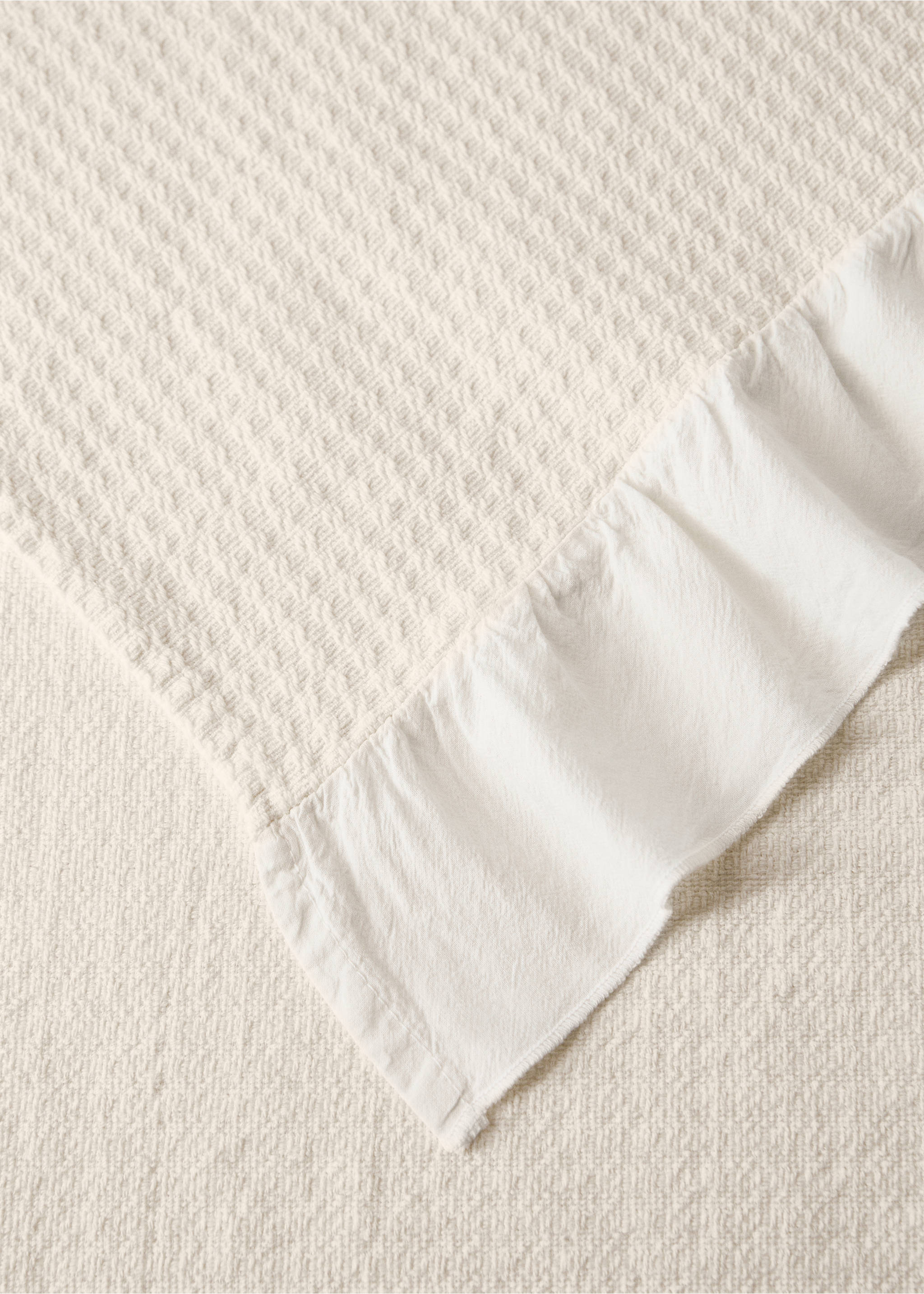 Jacquard cotton bedspread with ruffle for mini cot - Details of the article 2, Off White. Ref: 27094068-00.