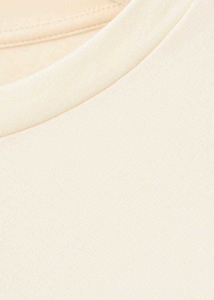 Fitted cotton T-shirt with asymmetric hem — Vanilla