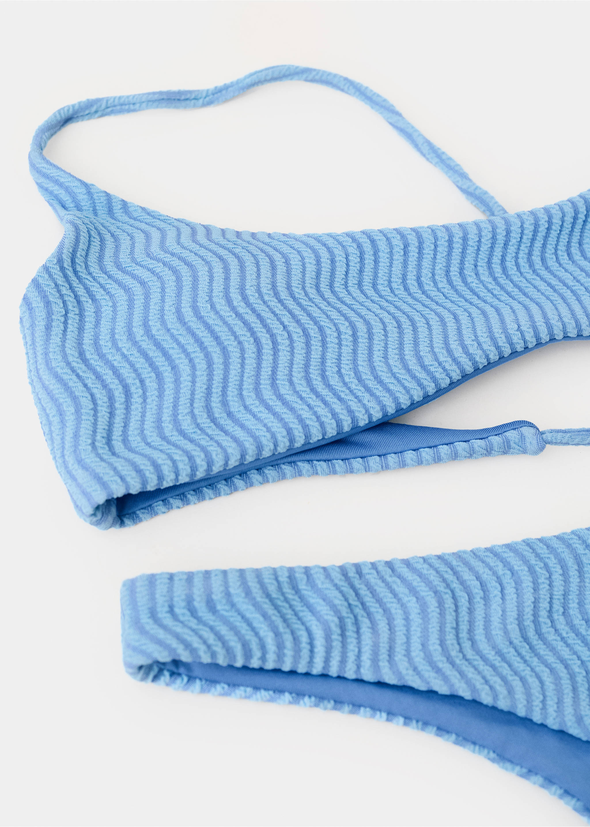 Bikini textured Brazilian knicker - Details of the article 8, Blue. Ref: 27094767-00.