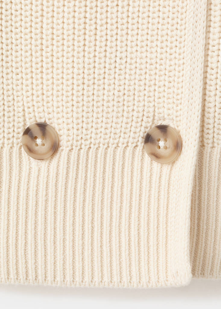 Knitted buttoned jacket — Ecru