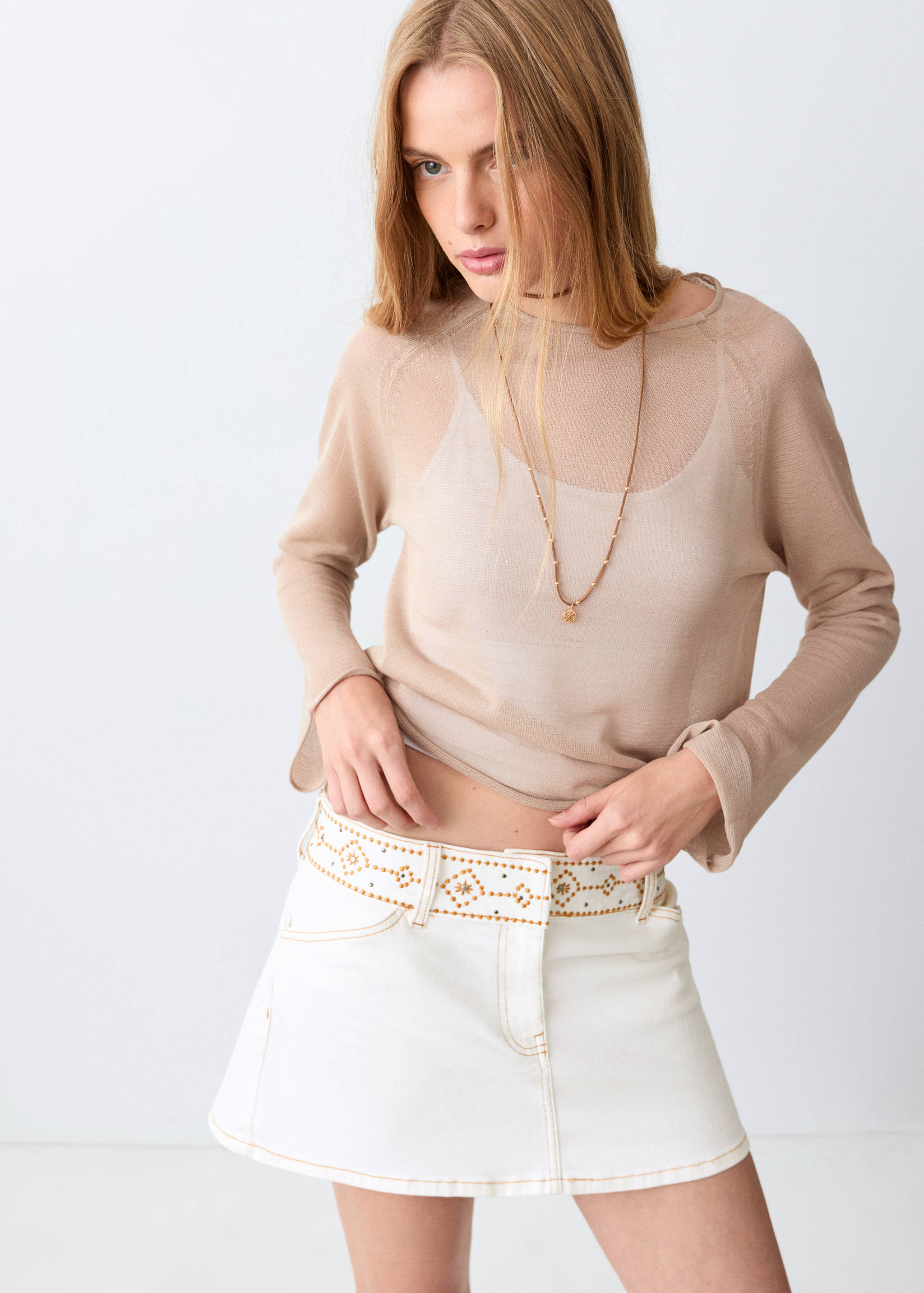 Short skirt with embroidered waist - Details of the article 1