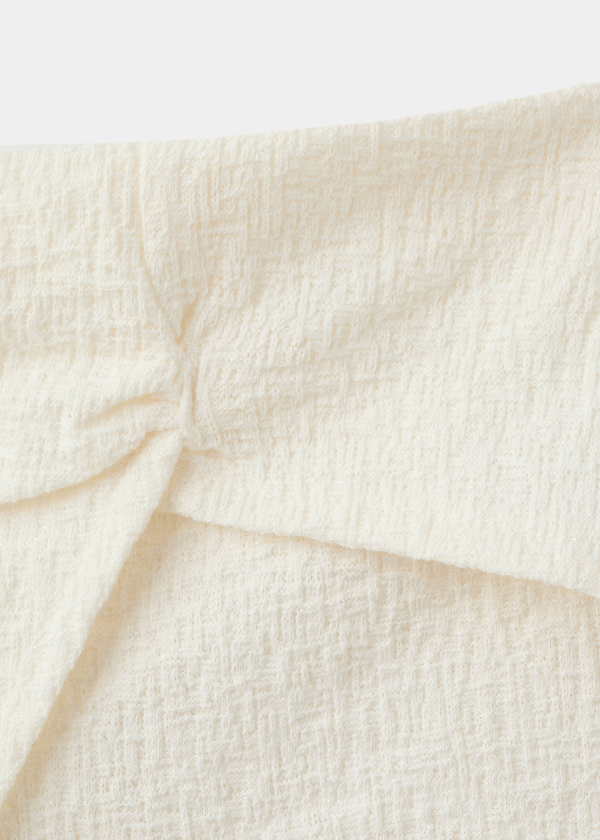 Saia-calça cruzada - Pormenor do artigo 8