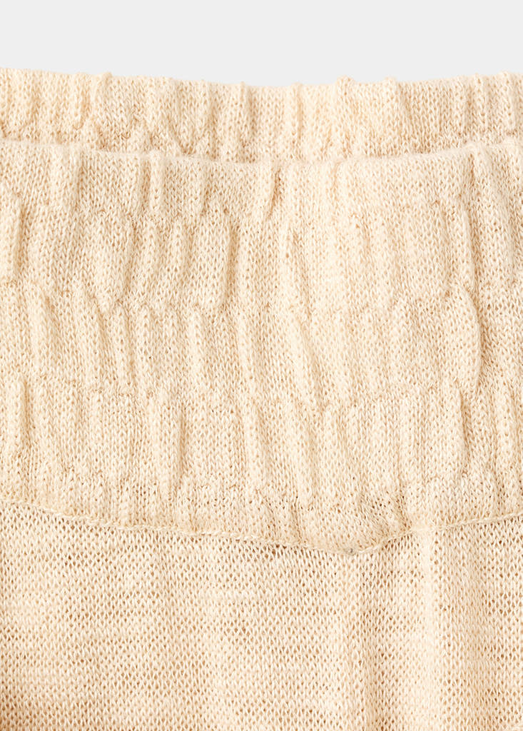 Fine knit trousers with knot detail — Ecru