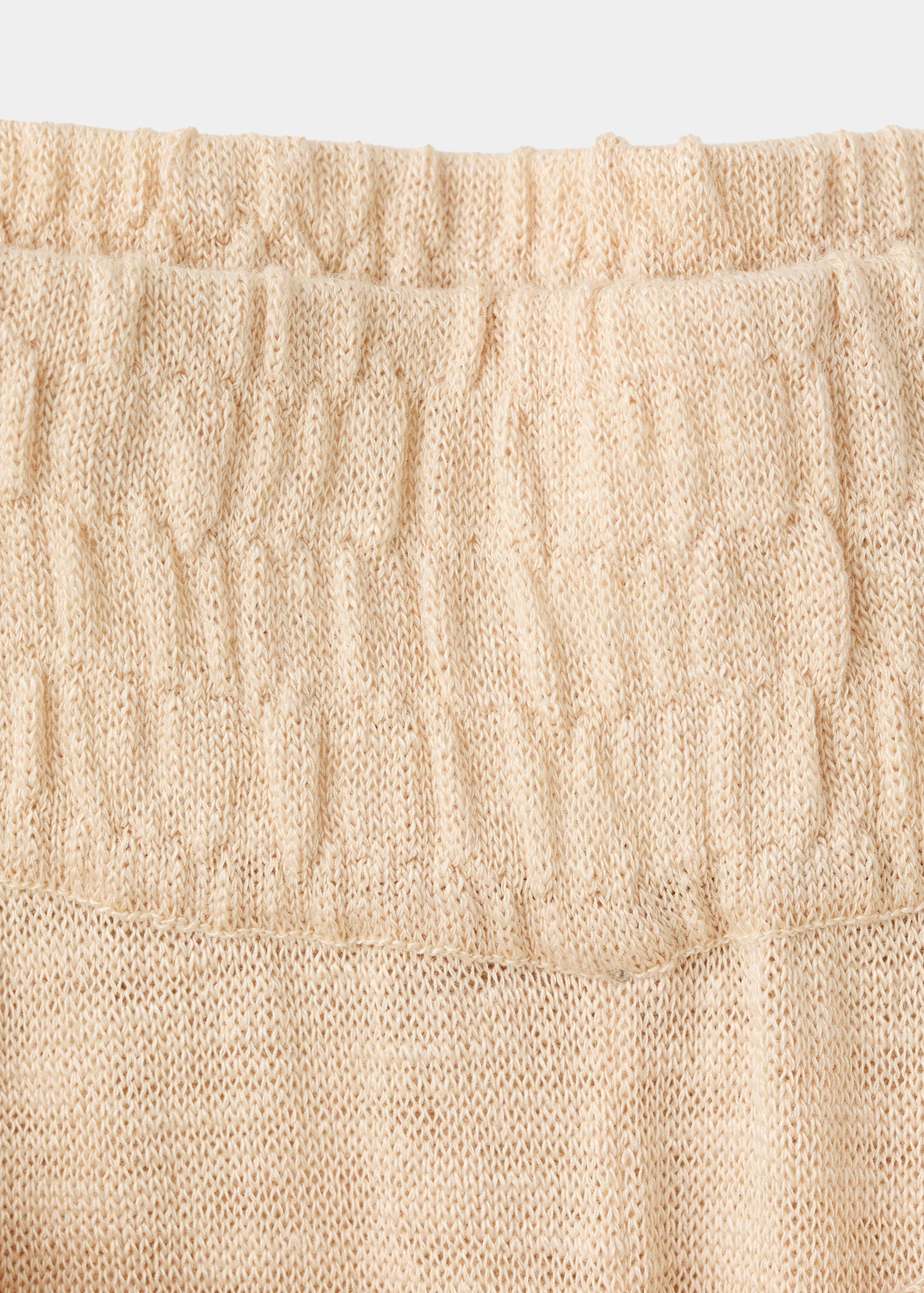 Fine knit trousers with knot detail - Details of the article 0