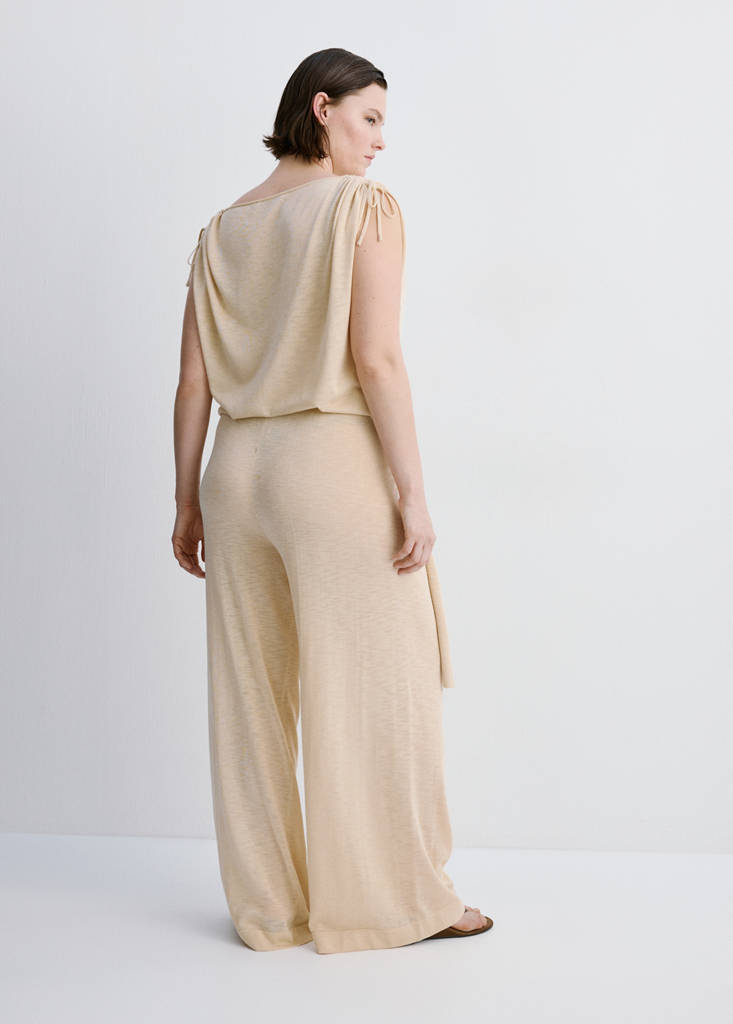 Fine knit trousers with knot detail — Ecru