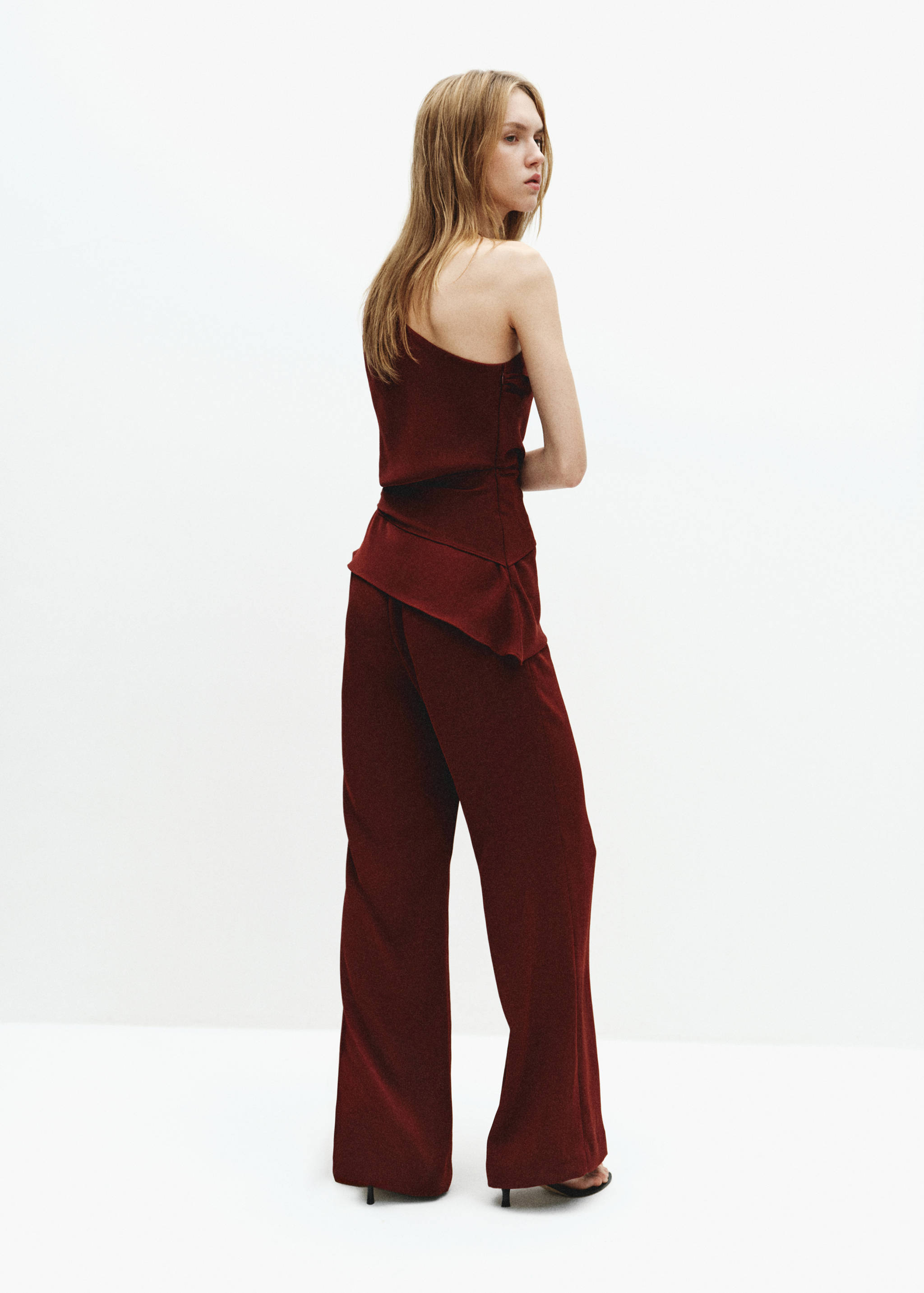 Asymmetrical jumpsuit with bow - Reverse of the article