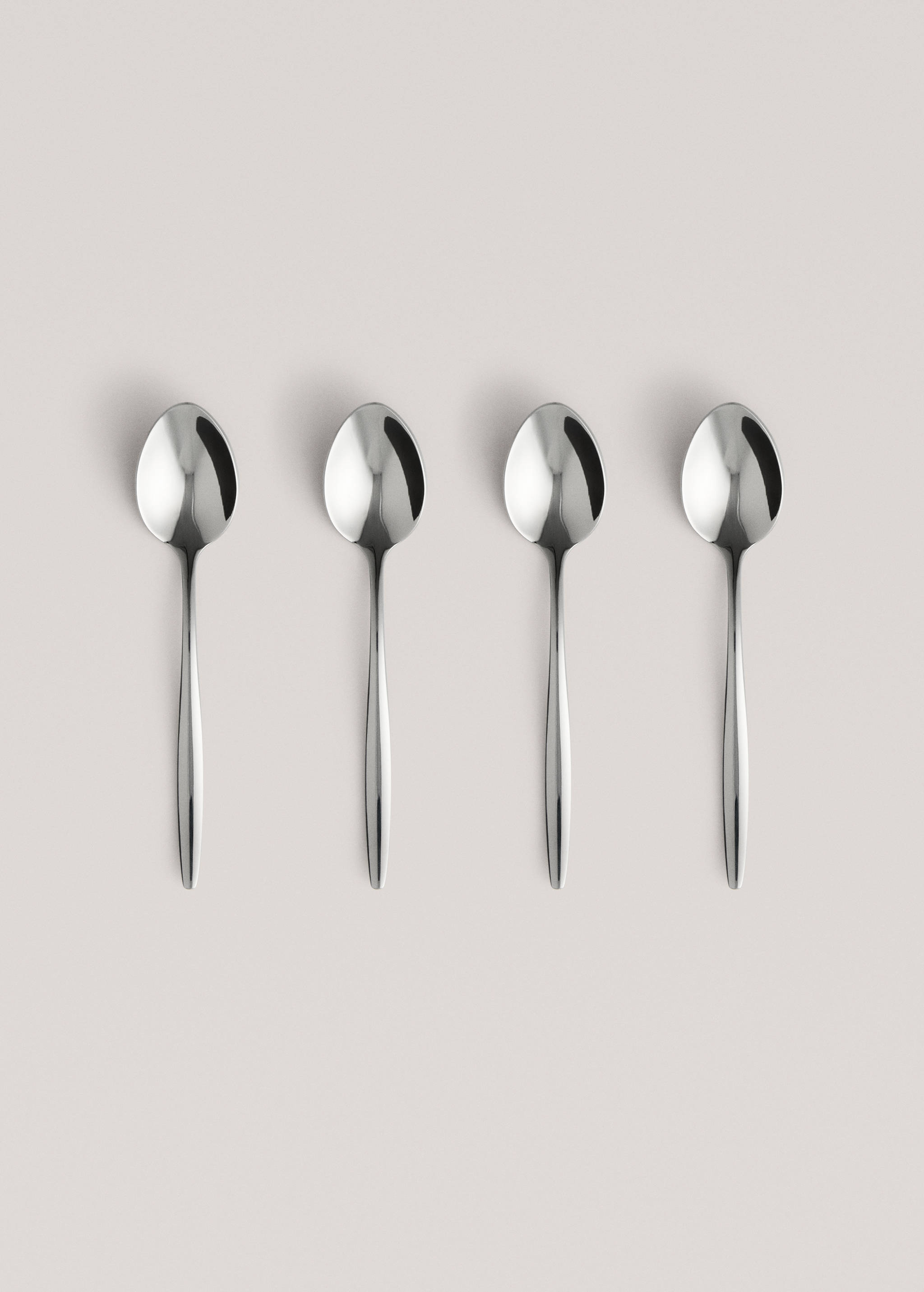 Set of 4 stainless steel dessert spoons with slim handles - Article without model