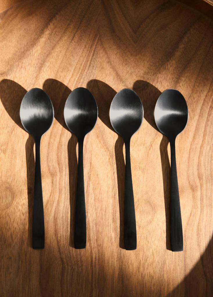 Set of 4 stainless steel dessert spoons with a matte finish — Black