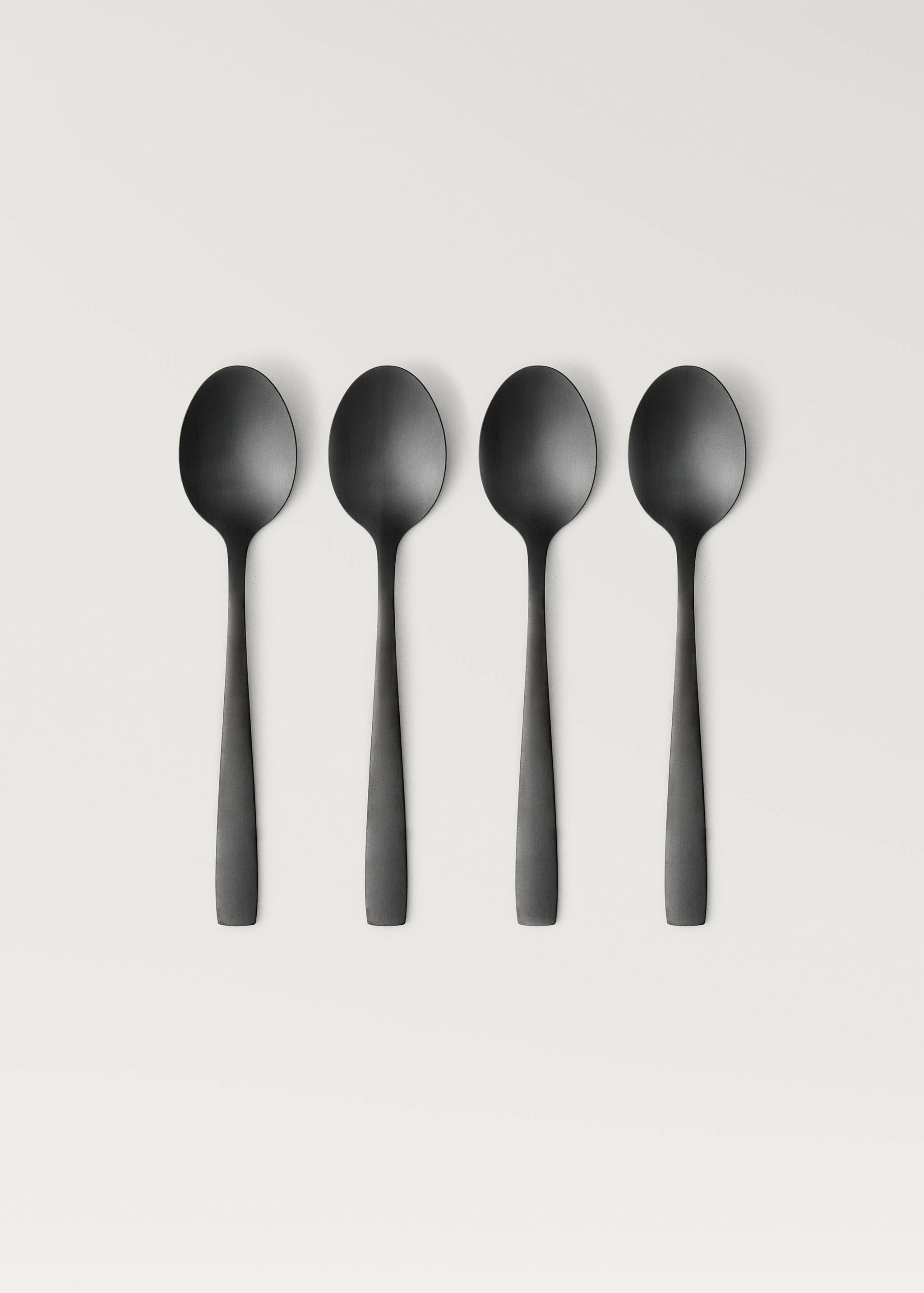 Set of 4 stainless steel dessert spoons with a matte finish - Article without model