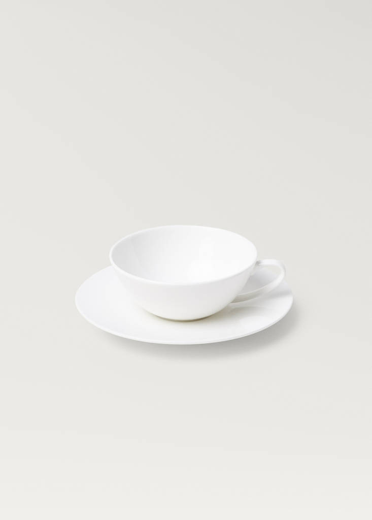 Premium bonne porcelain teacup and saucer — Off White