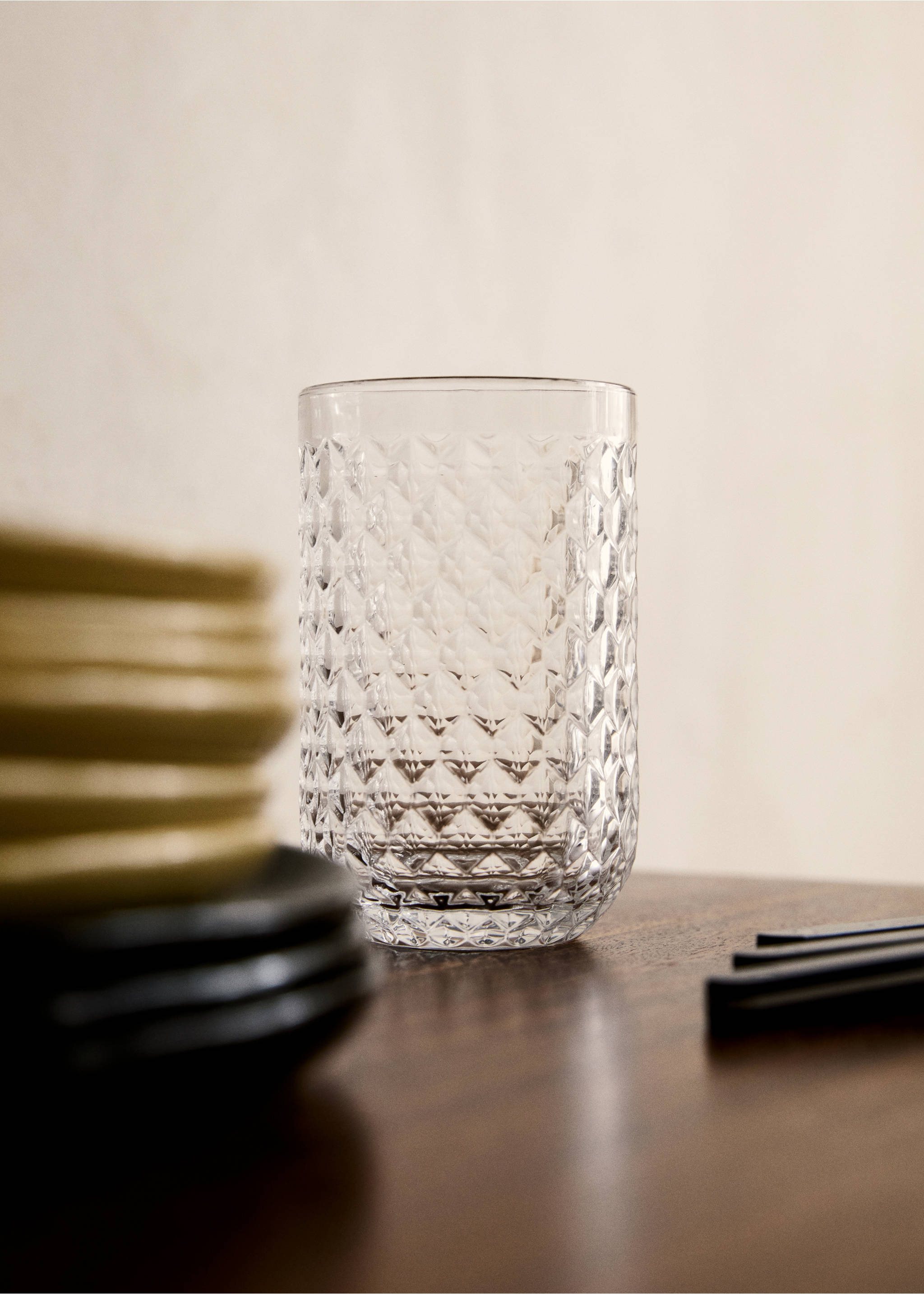 Clear glass tumbler with an all-over geometric faceted texture., Ice Grey. Ref: 27172938-00.