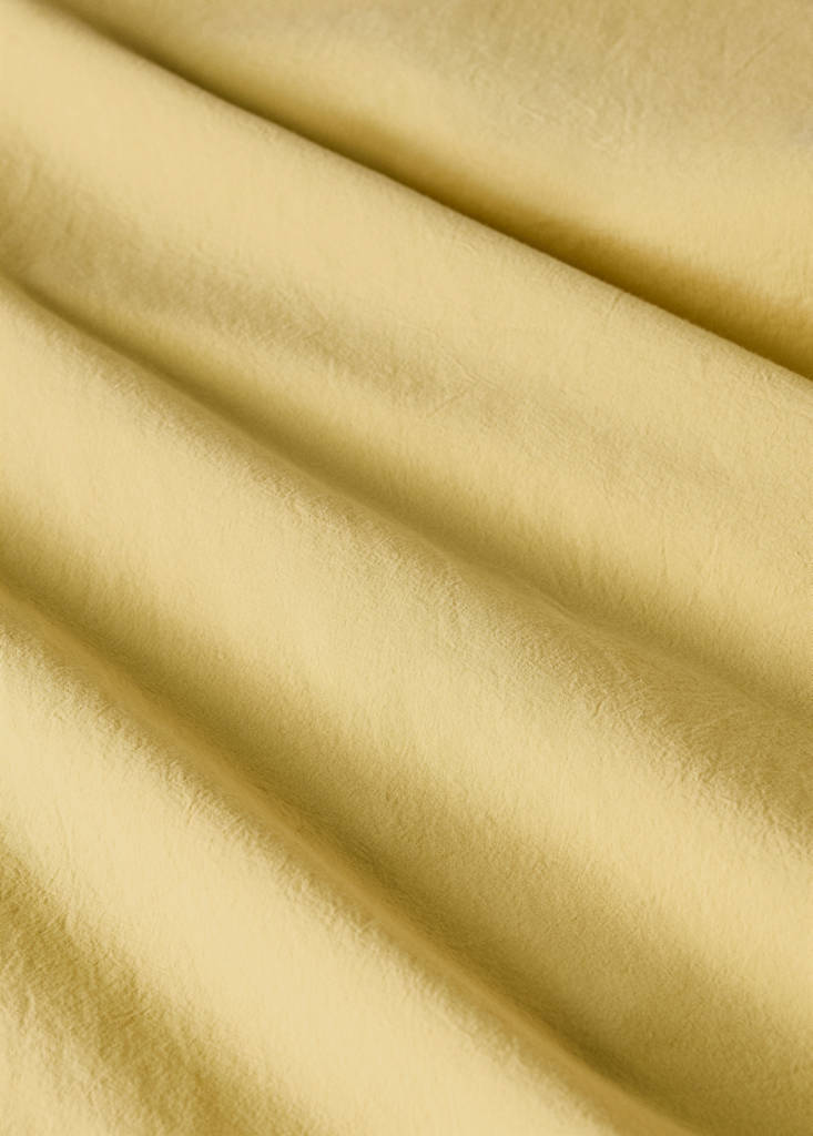 Washed cotton double-stitched top sheet for cot — Mustard