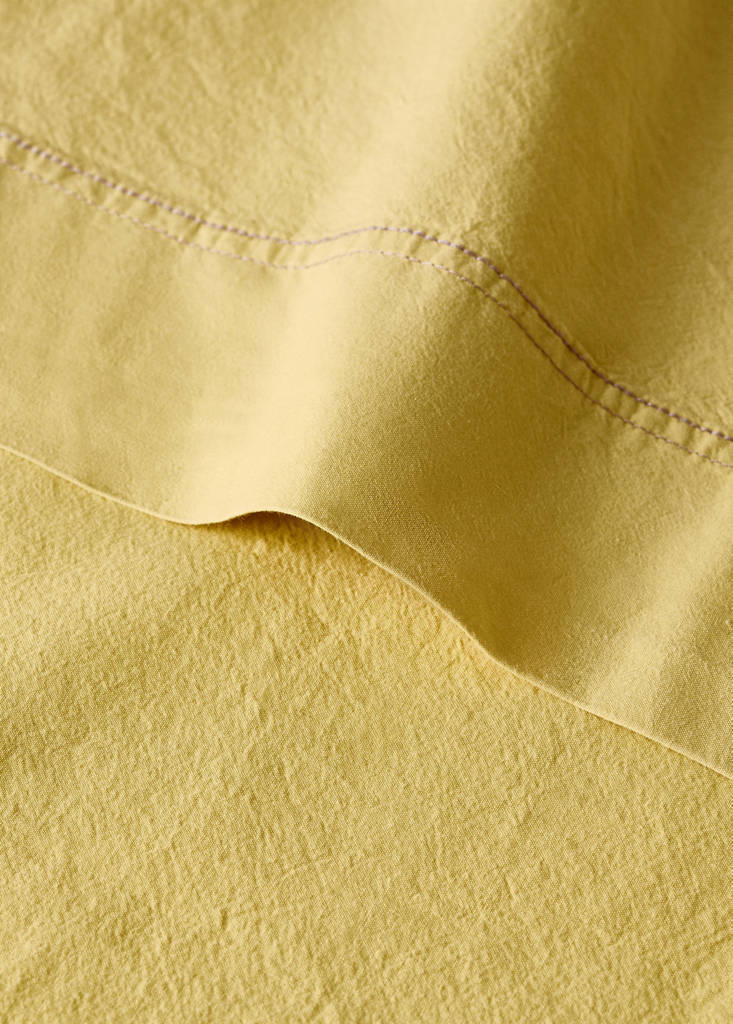 Washed cotton double-stitched top sheet for cot — Mustard