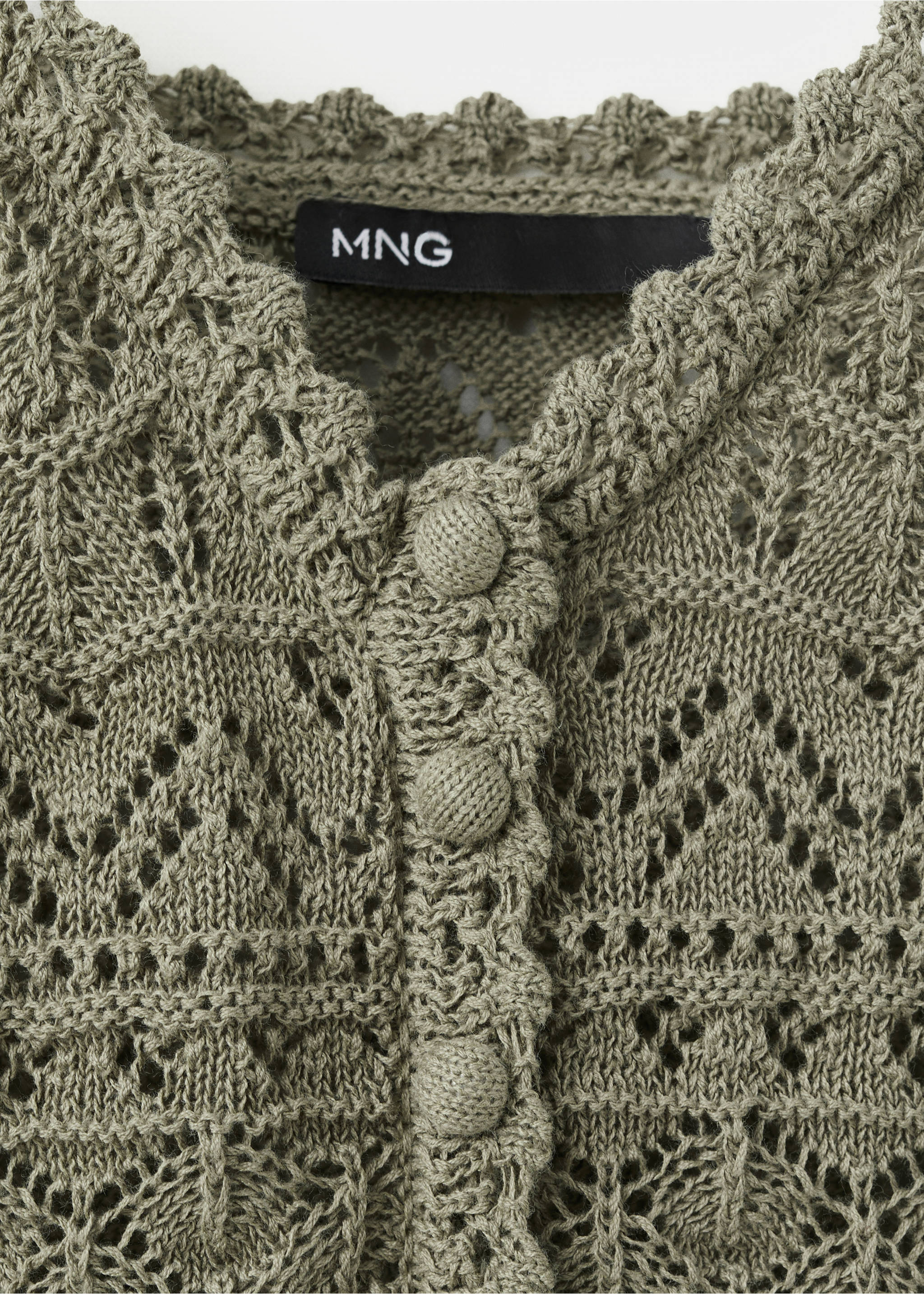 Openwork knitted top with buttons - Details of the article 8, Khaki. Ref: 37001388-00.