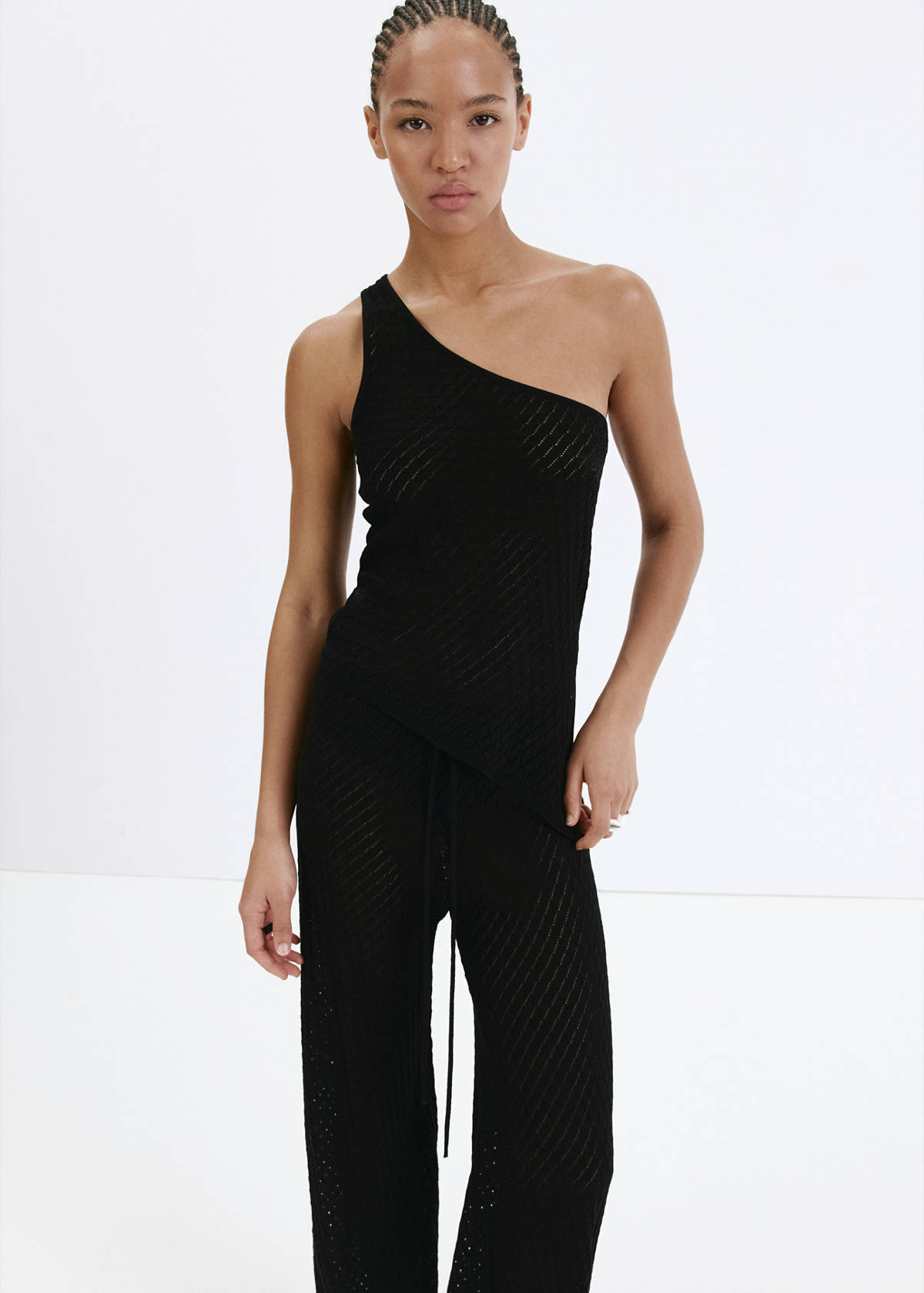 Asymmetric openwork knit top — Black