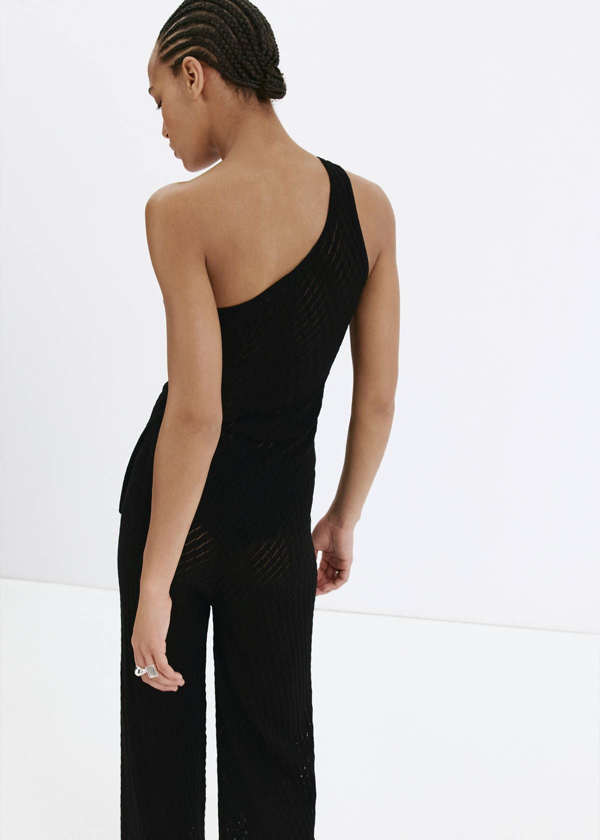 Asymmetric openwork knit top — Black