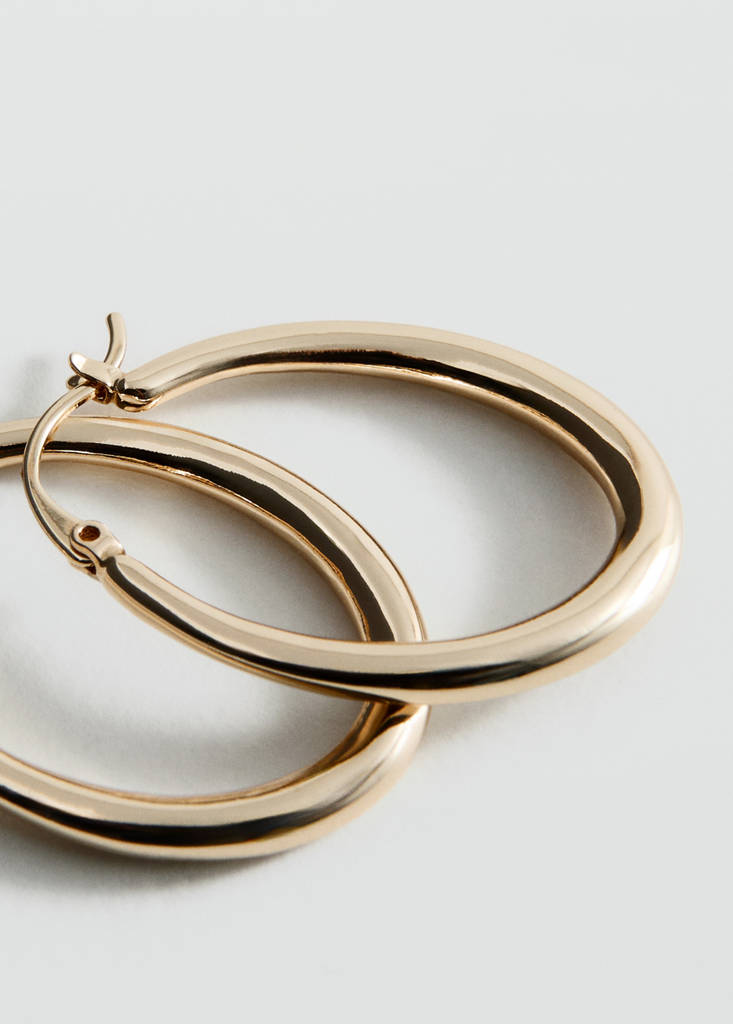 Oval hoop earrings — Gold