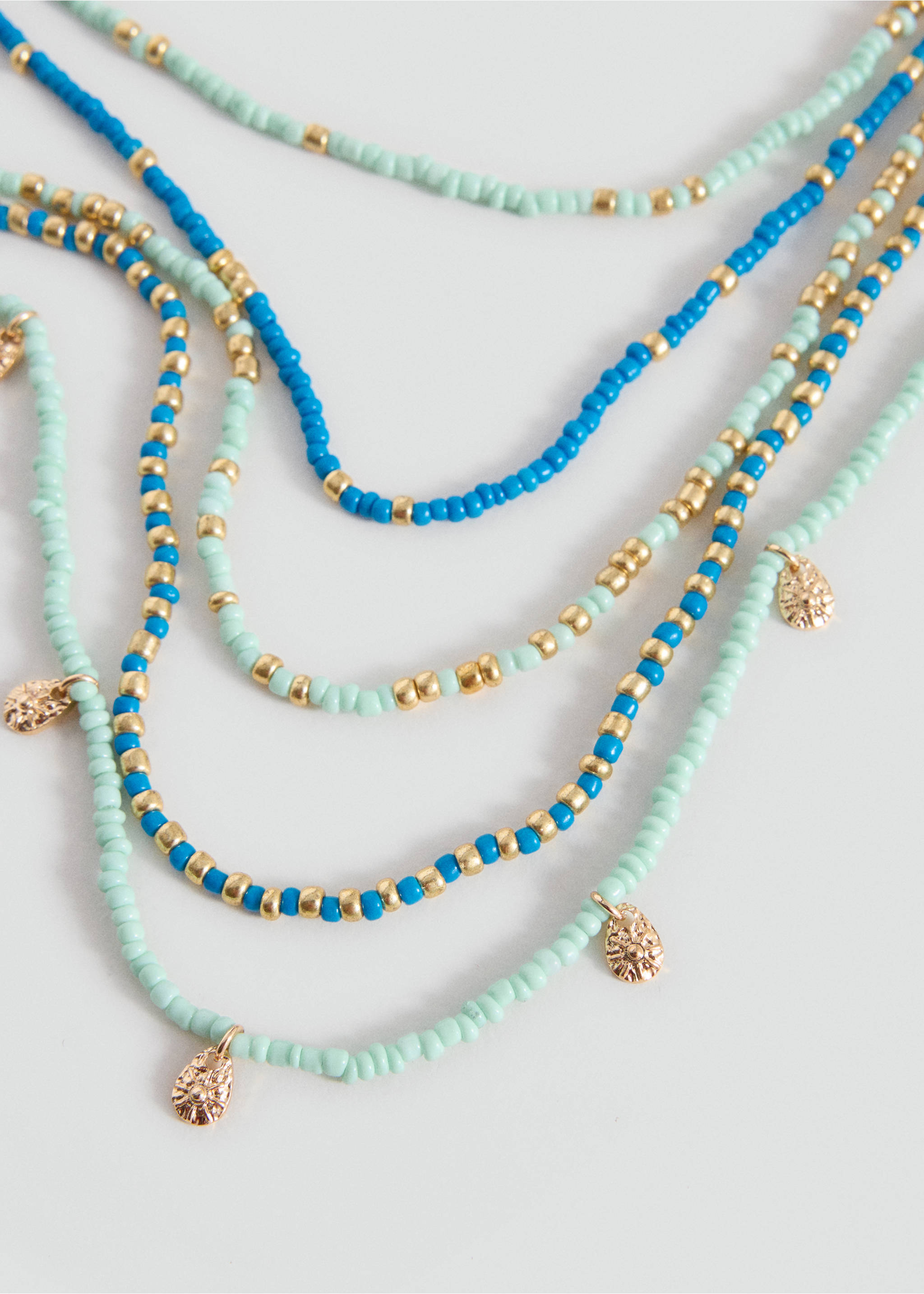 Multichain bead necklace - Medium plane, Gold. Ref: 37001552-00.