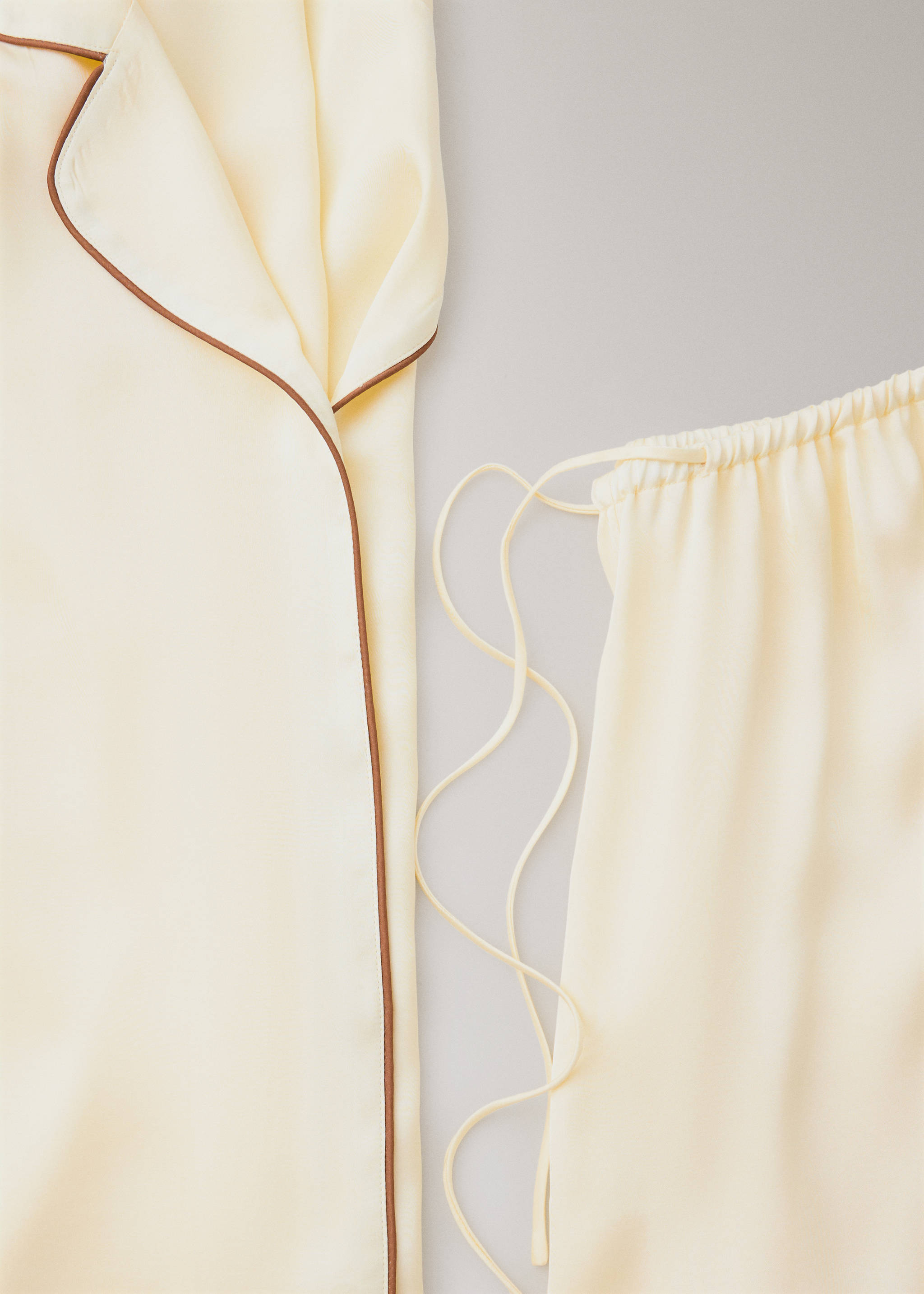 Satin viscose trousers with contrast pipping - Details of the article 0