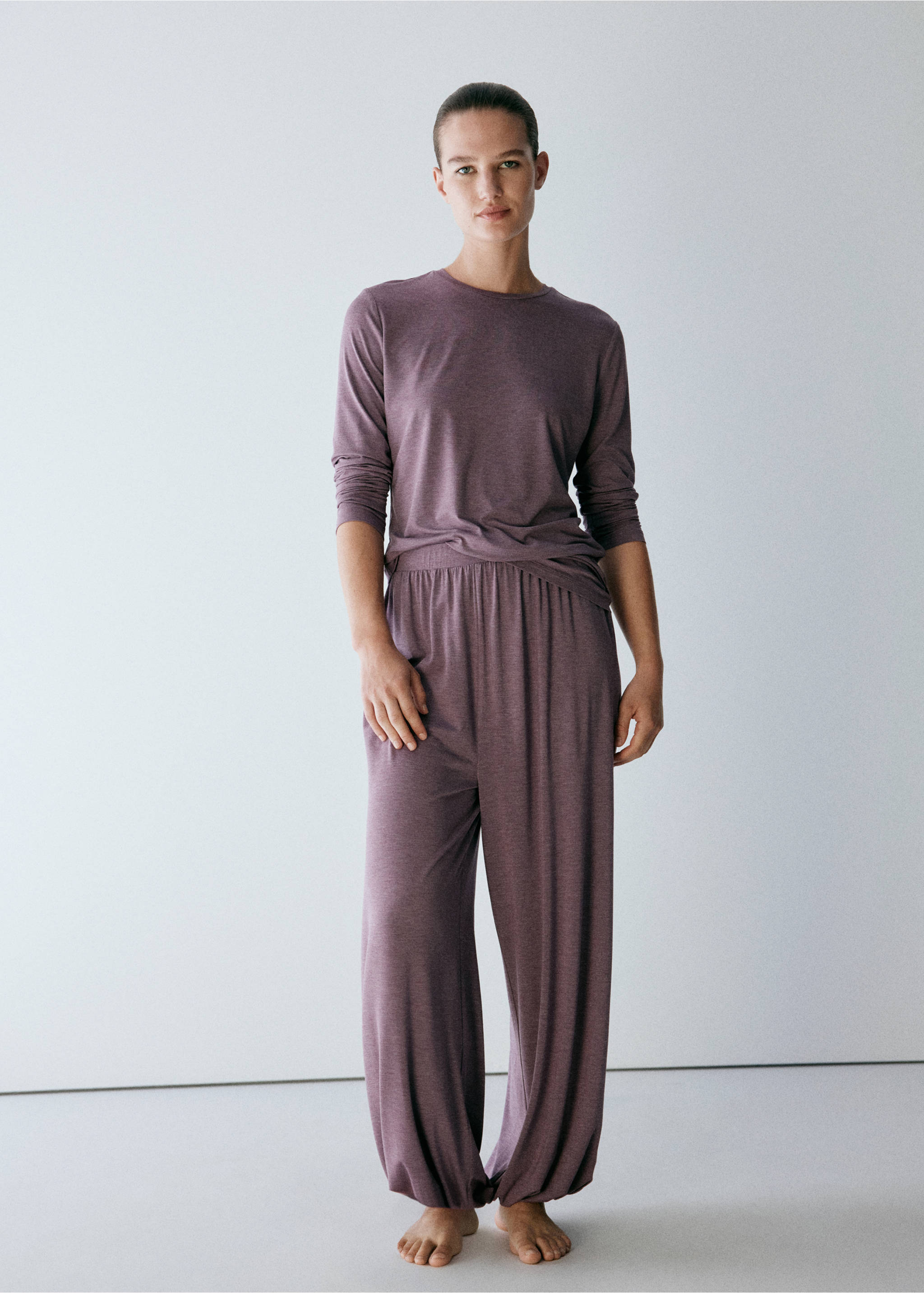 Mauve pyjama trousers with an elasticated waistband and gathered ankle cuffs, worn with a matching top., Purple. Ref: 37002928-00.