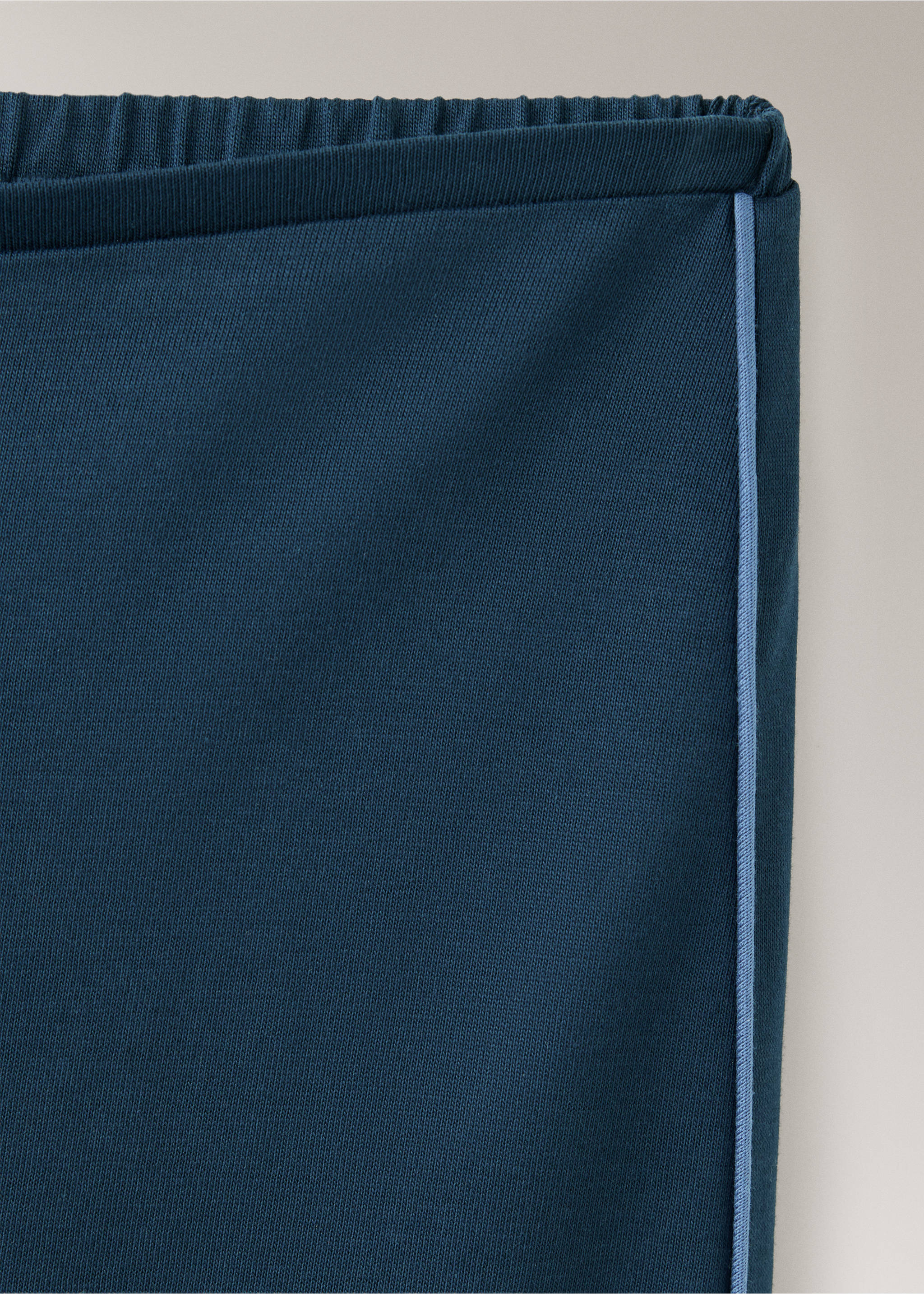 Close-up of dark blue pyjama trousers with light blue piping., Navy. Ref: 37002929-00.