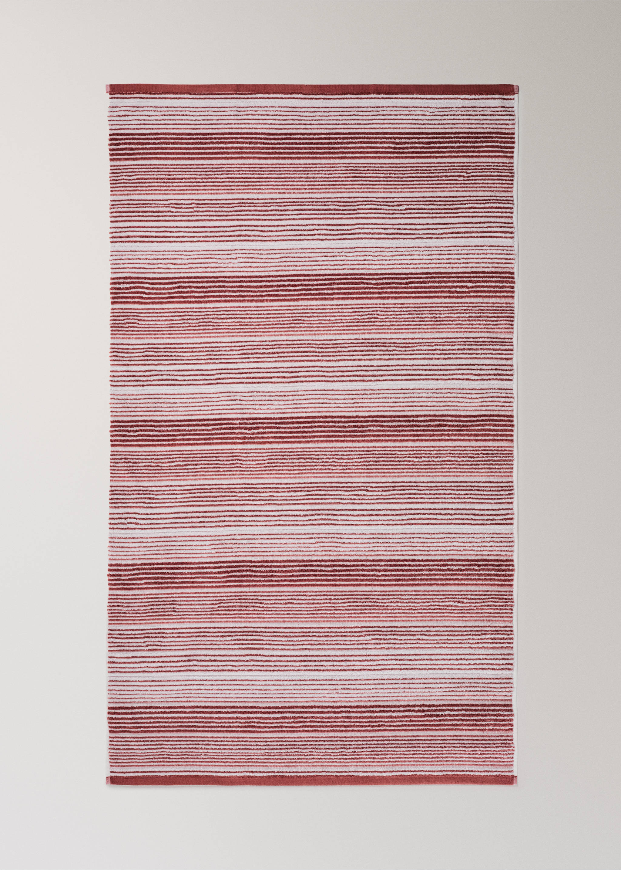 Cotton terry bath towel with striped design - Details of the article 1, Burnt Orange. Ref: 37002954-00.