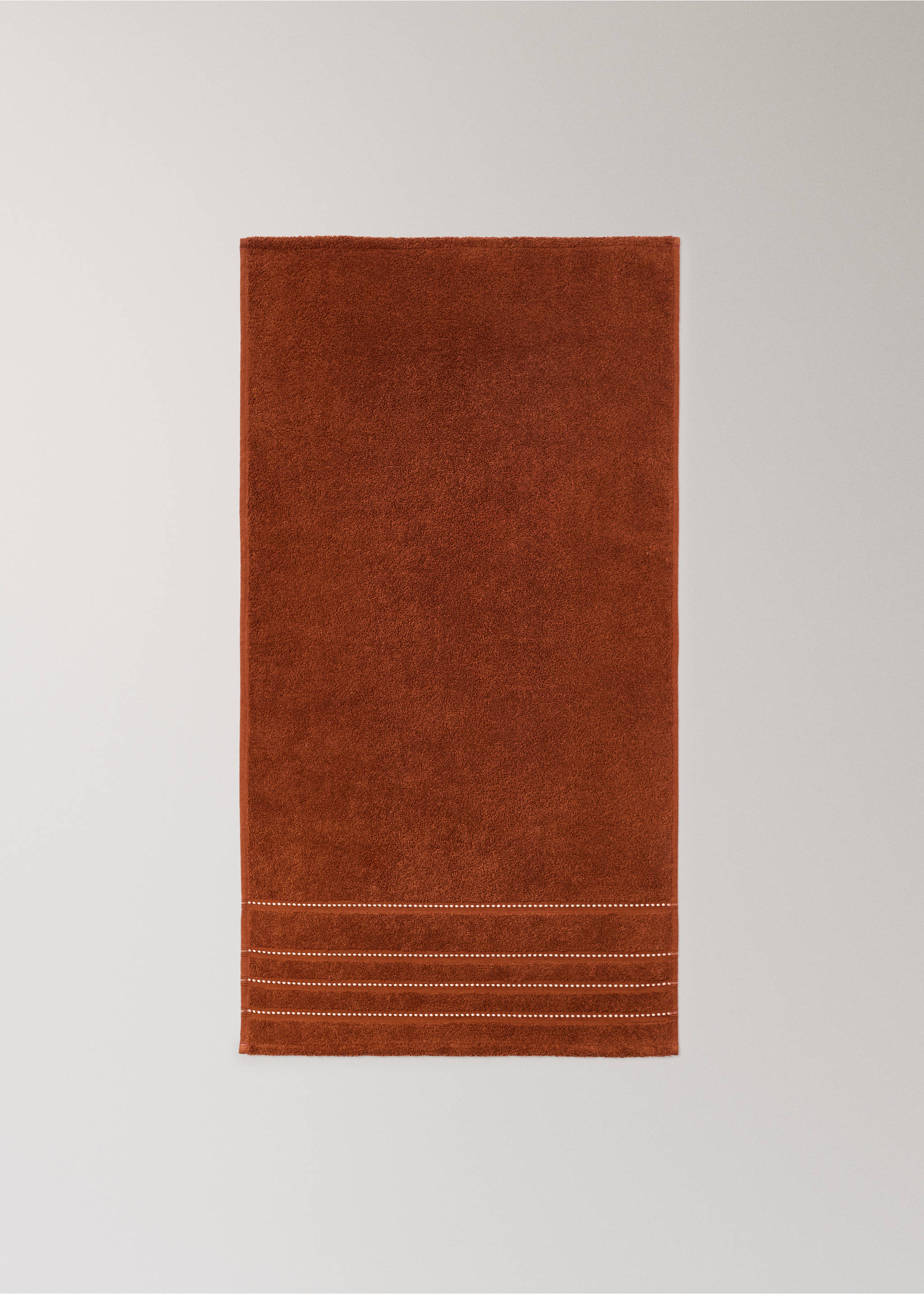 Cotton washbasin towel with stitching - Details of the article 3, Tobacco Brown. Ref: 37002963-00.