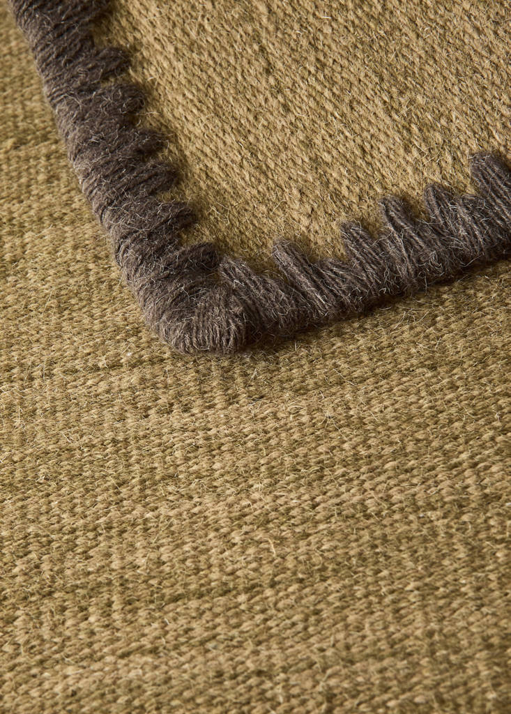 Medium melange carpet with stitched border — Ochre