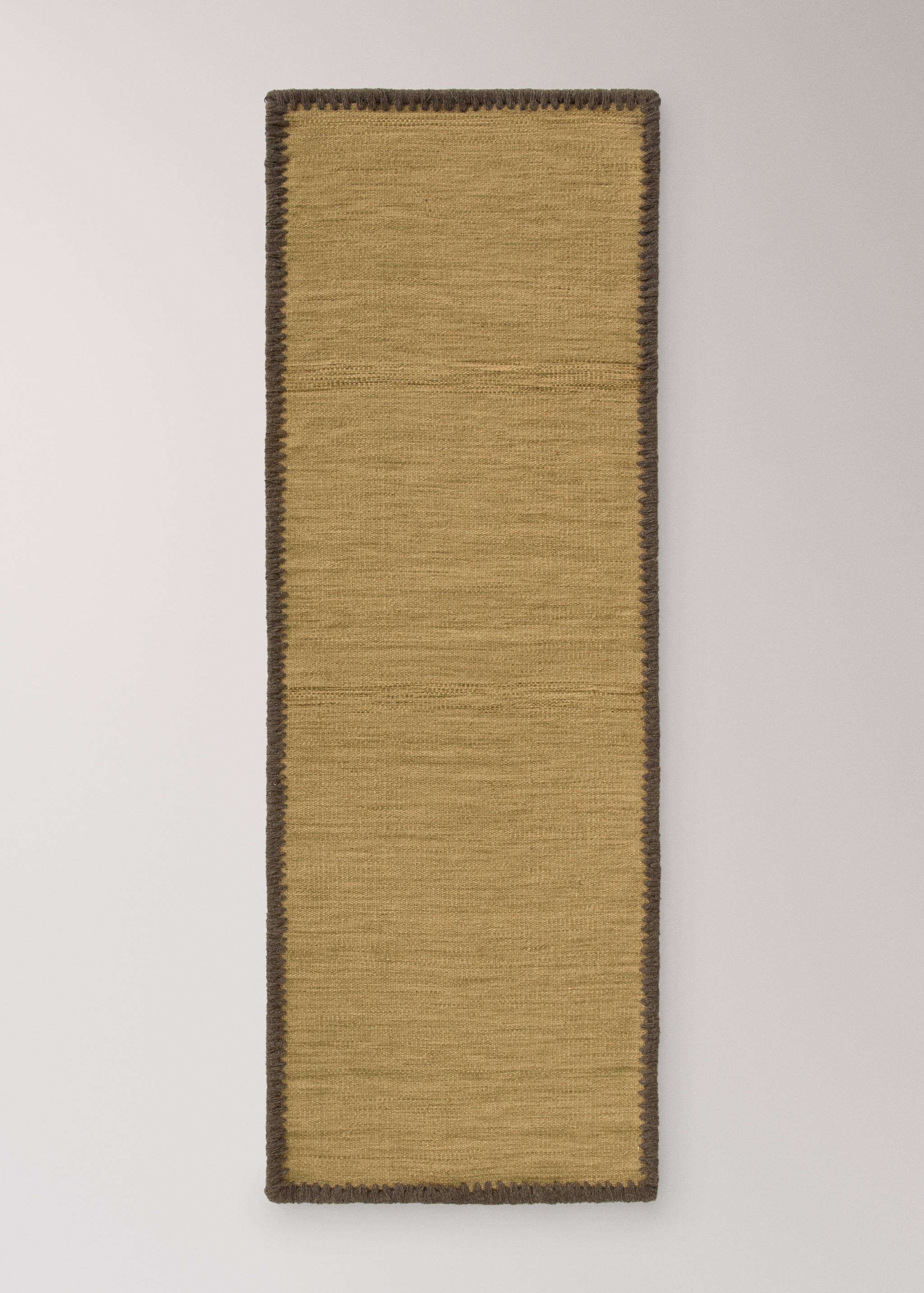 Medium melange carpet with stitched border - Article without model