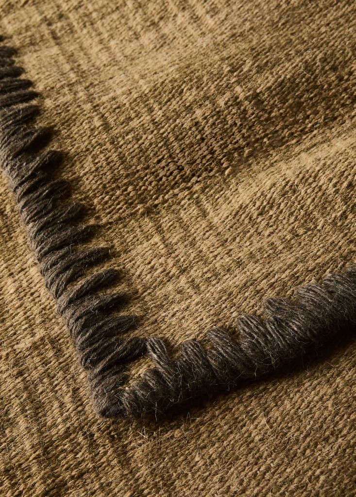 Medium melange carpet with stitched border — Ochre