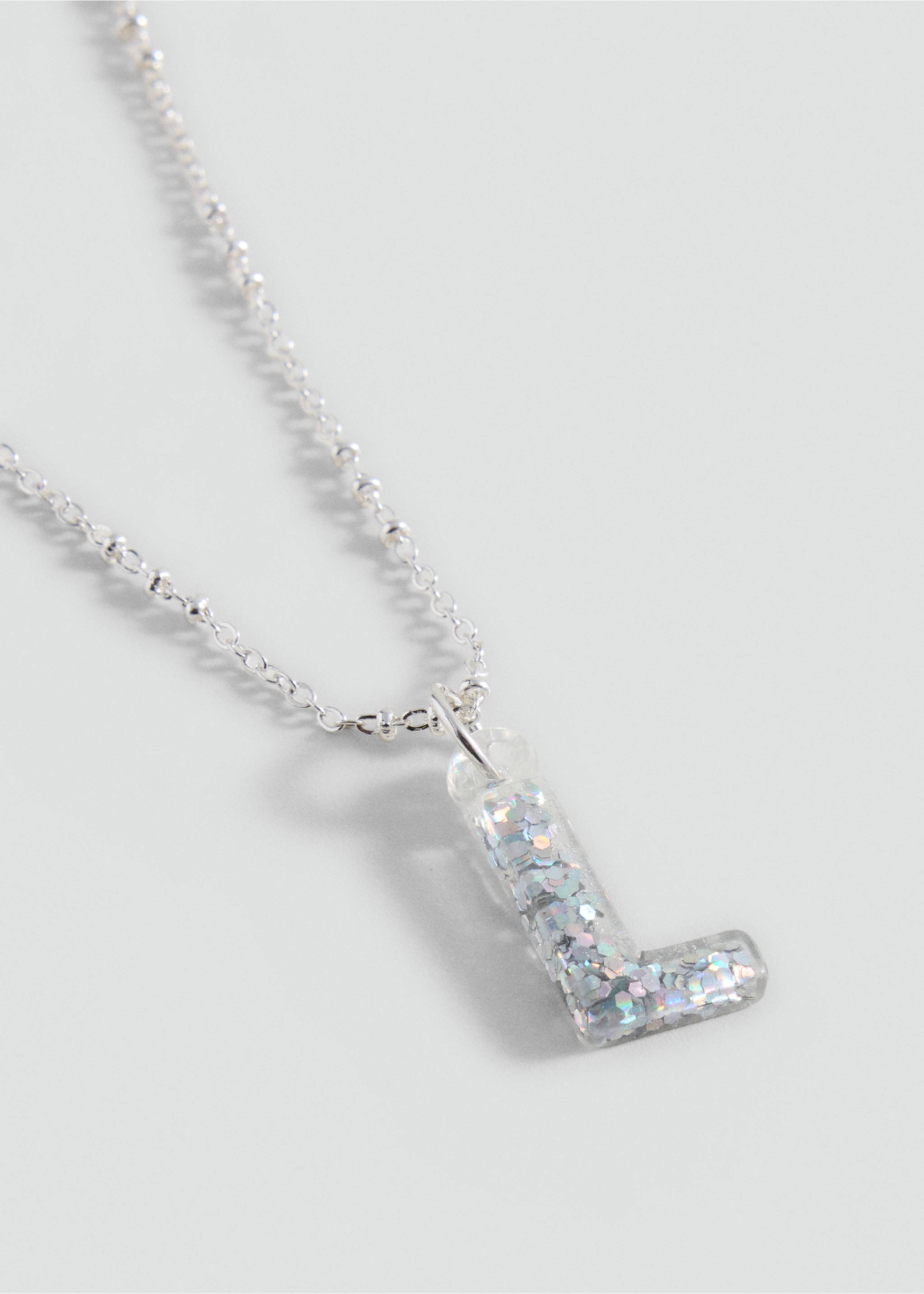 Letter Pendant Necklace - Medium plane, Silver. Ref: 37003902-00.