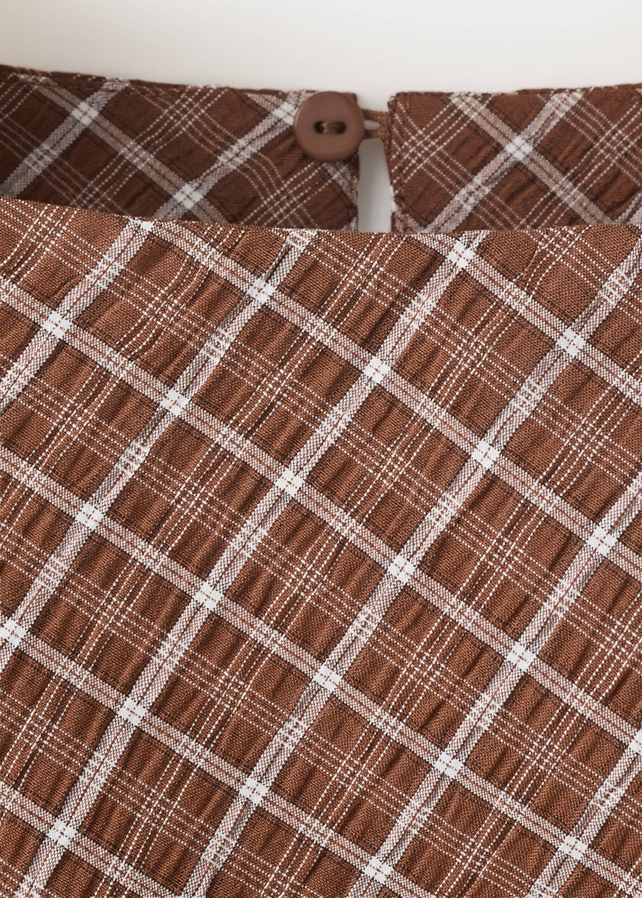 Asymmetric checked blouse - Details of the article 0